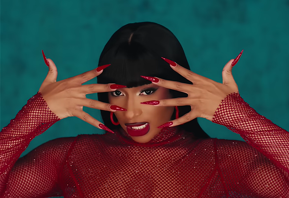 Megan Thee Stallion dressed in red