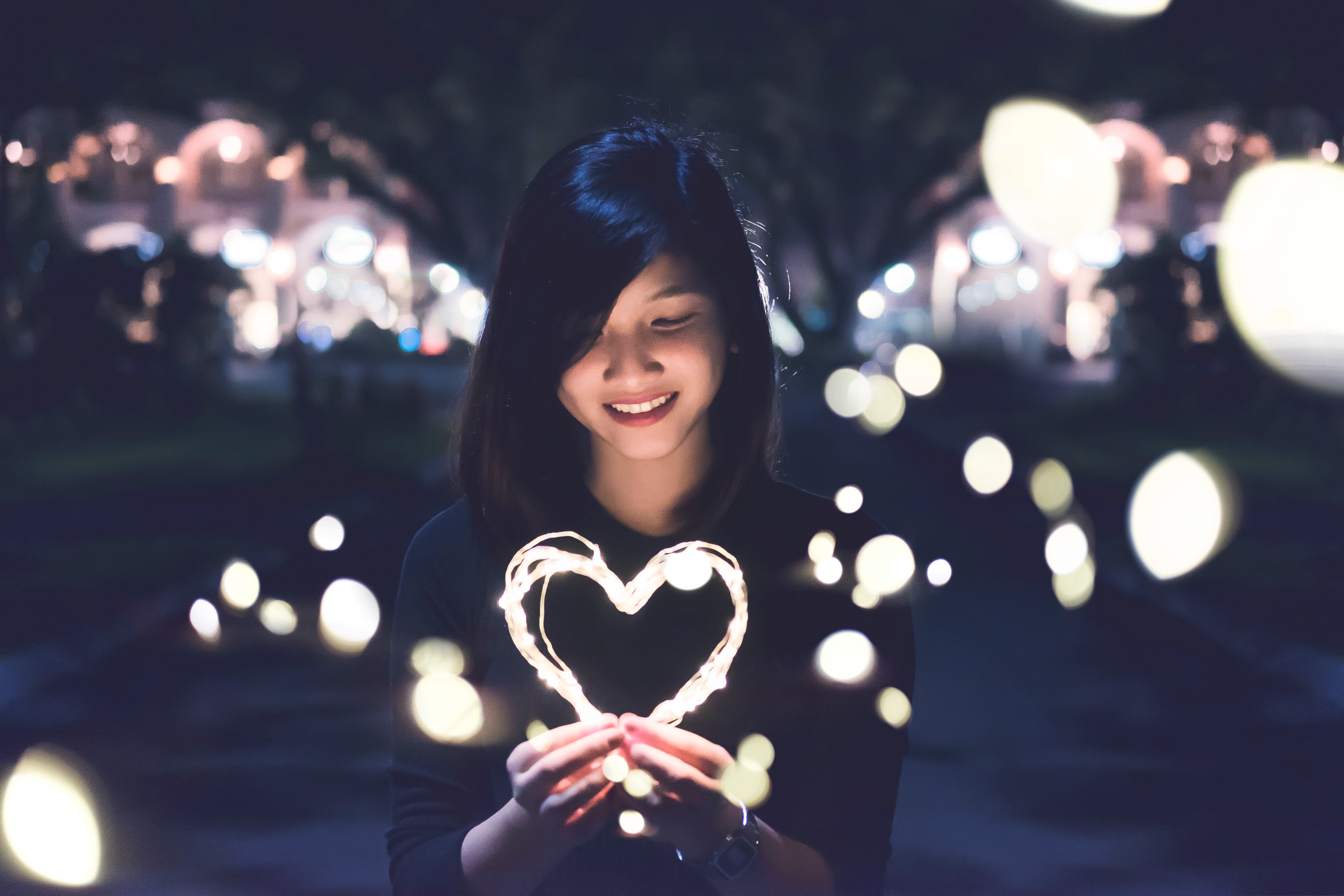 woman holding heart shape by Bart LaRue on Unsplash?width=698&height=466&fit=crop&auto=webp&dpr=4