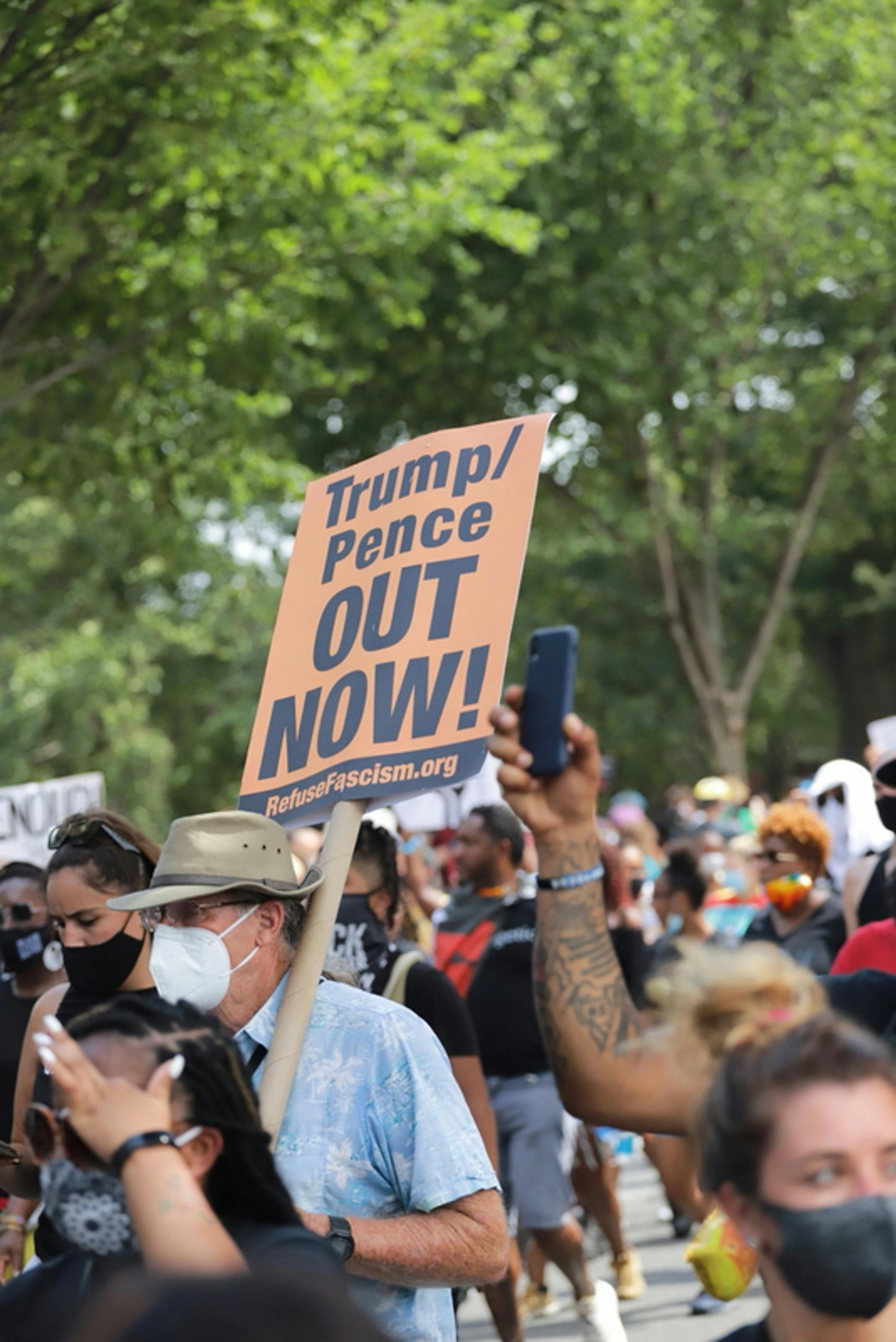 man holding sign