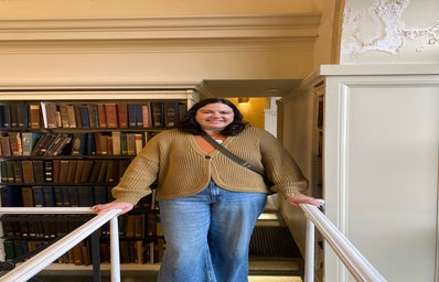 Woman standing in library