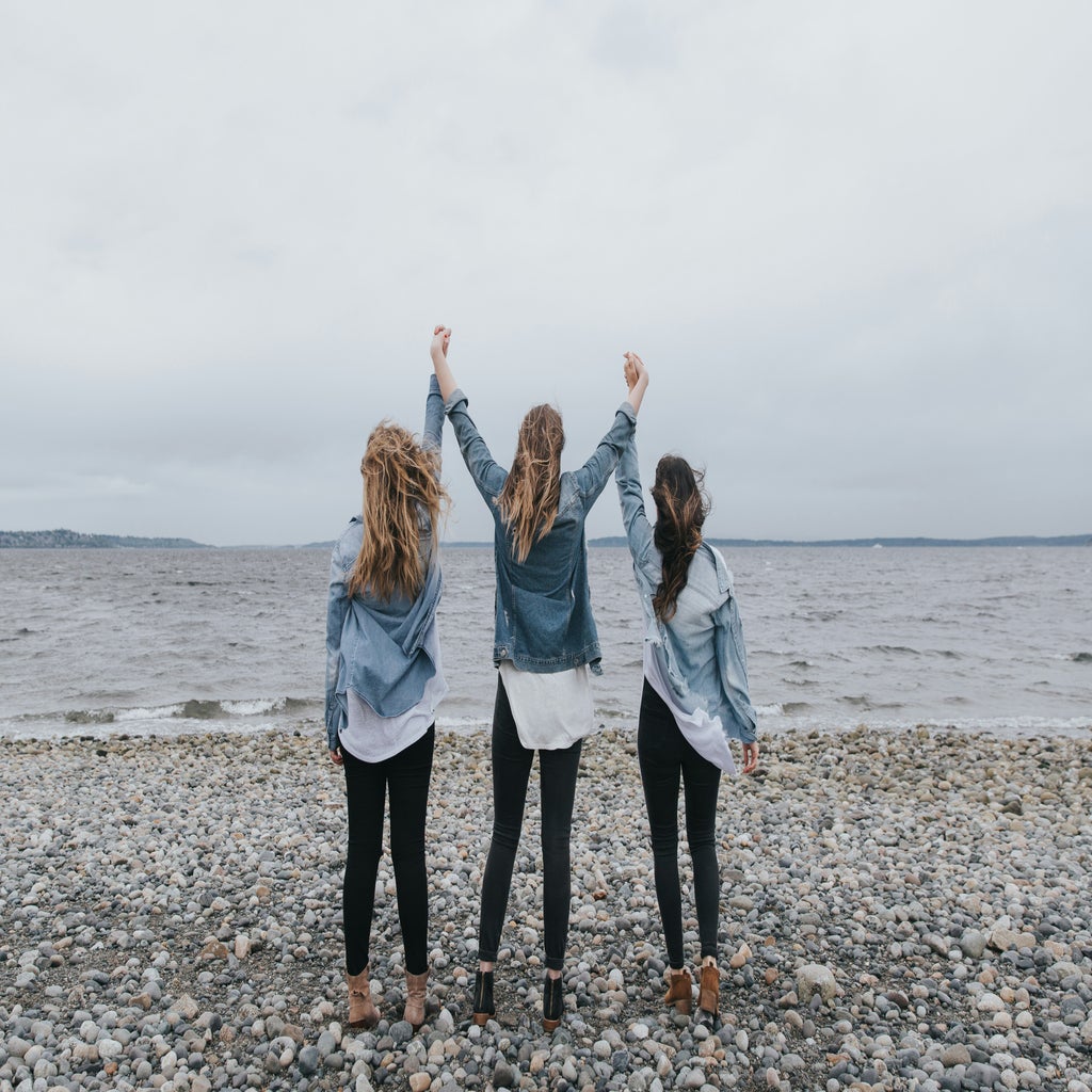 friends holding hands