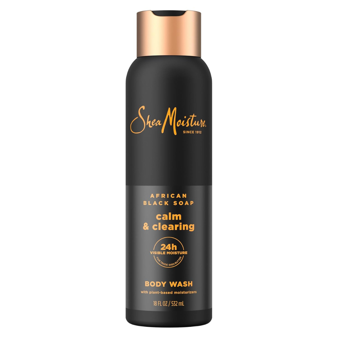 A bottle of SheaMoisture African Black Soap Body Wash, labeled calm & clearing. The bottle is black with copper accents, offering 24-hour visible moisture and containing plant-based moisturizers. Size is 18 fl oz (532 ml).