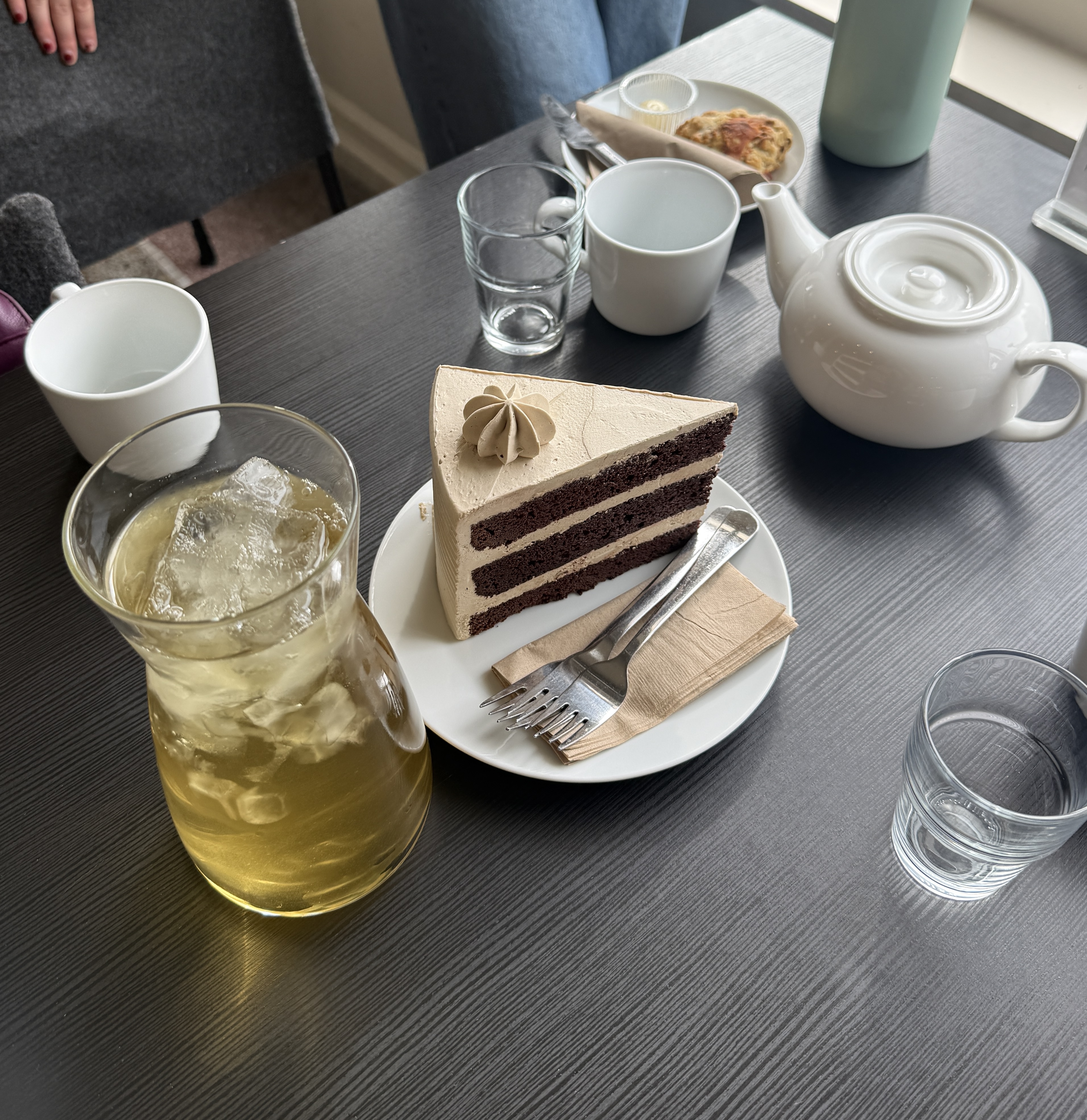 chocolate cake and tea on table