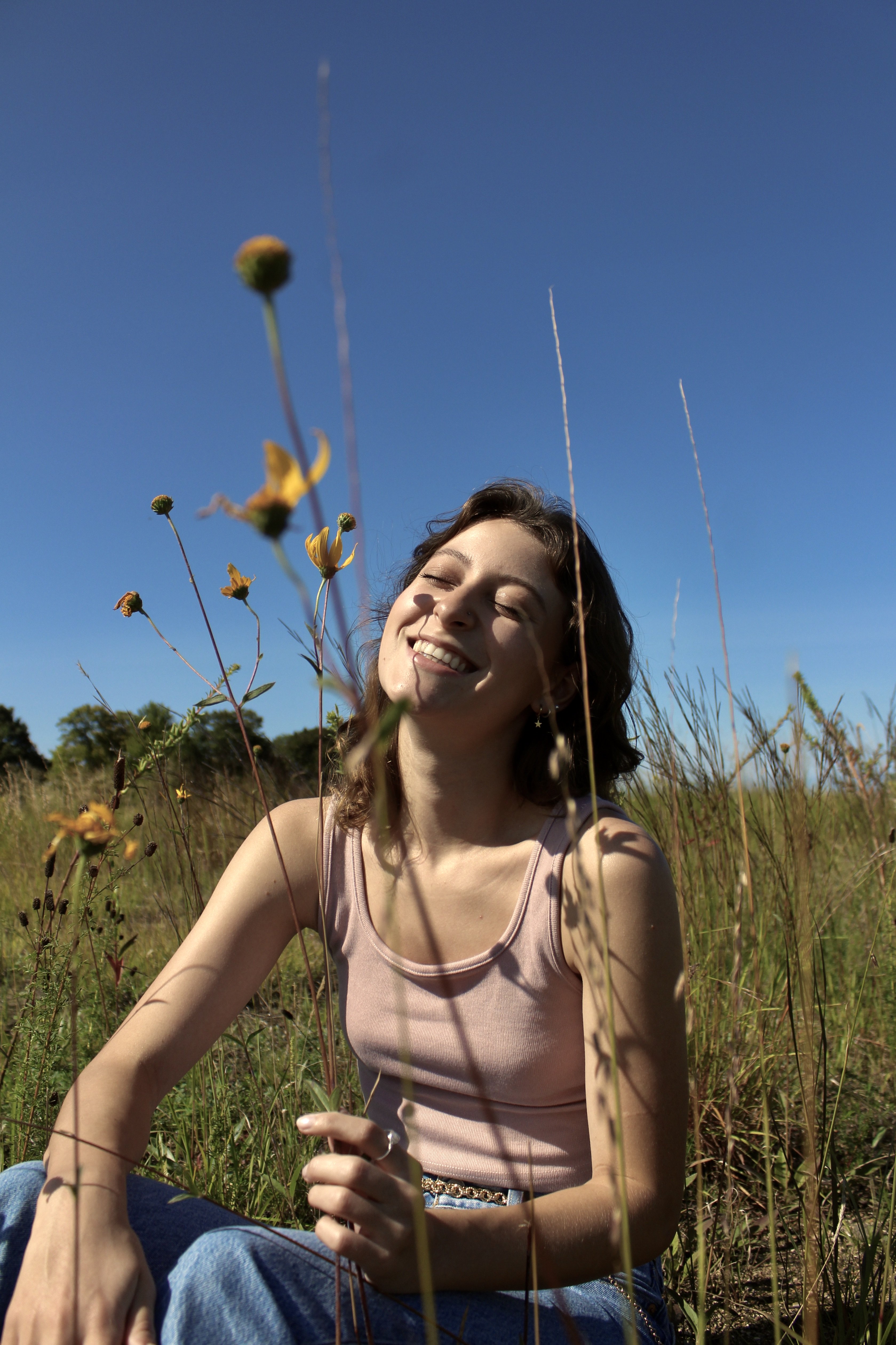 Girl in wildflower field