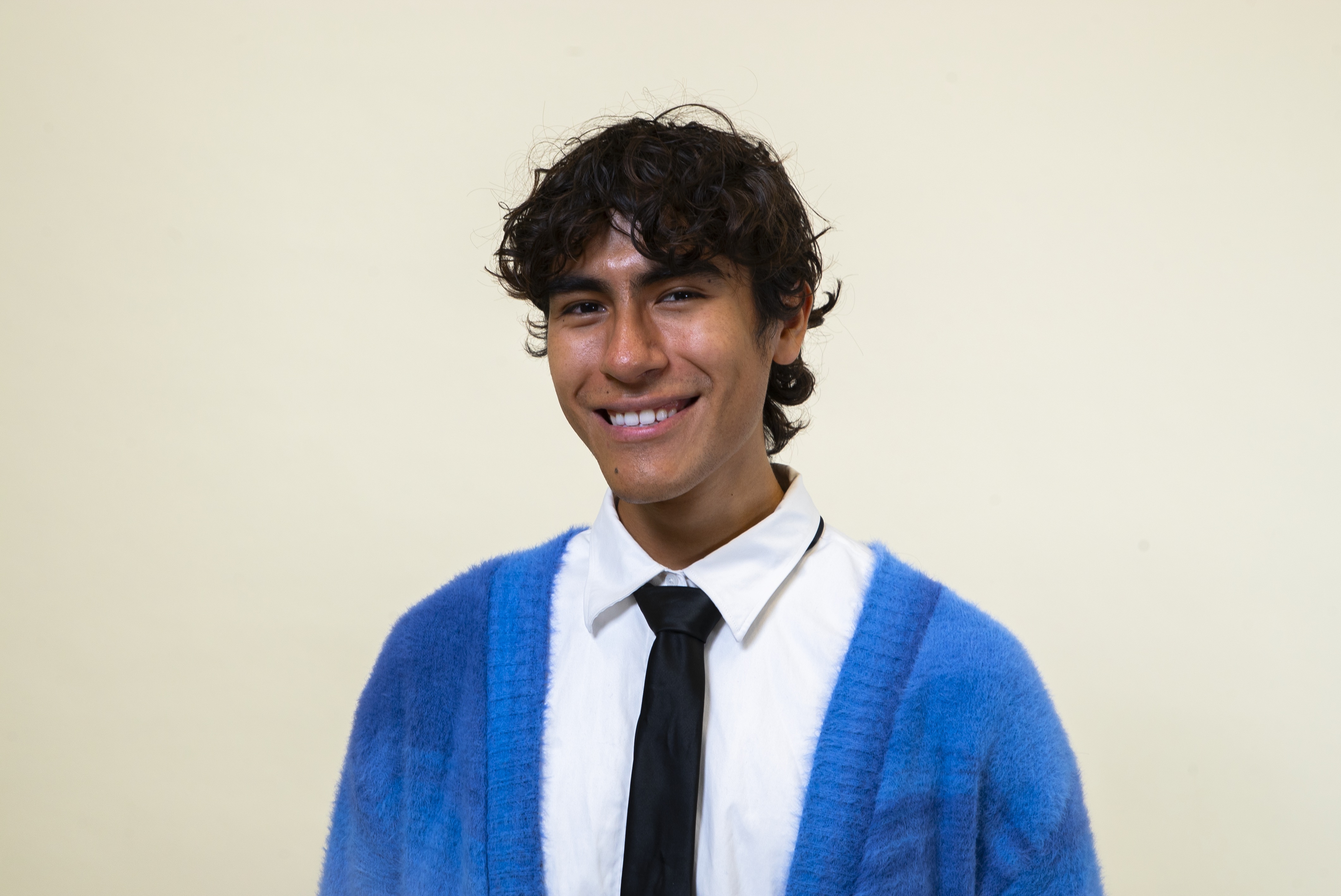 boy in front of wall