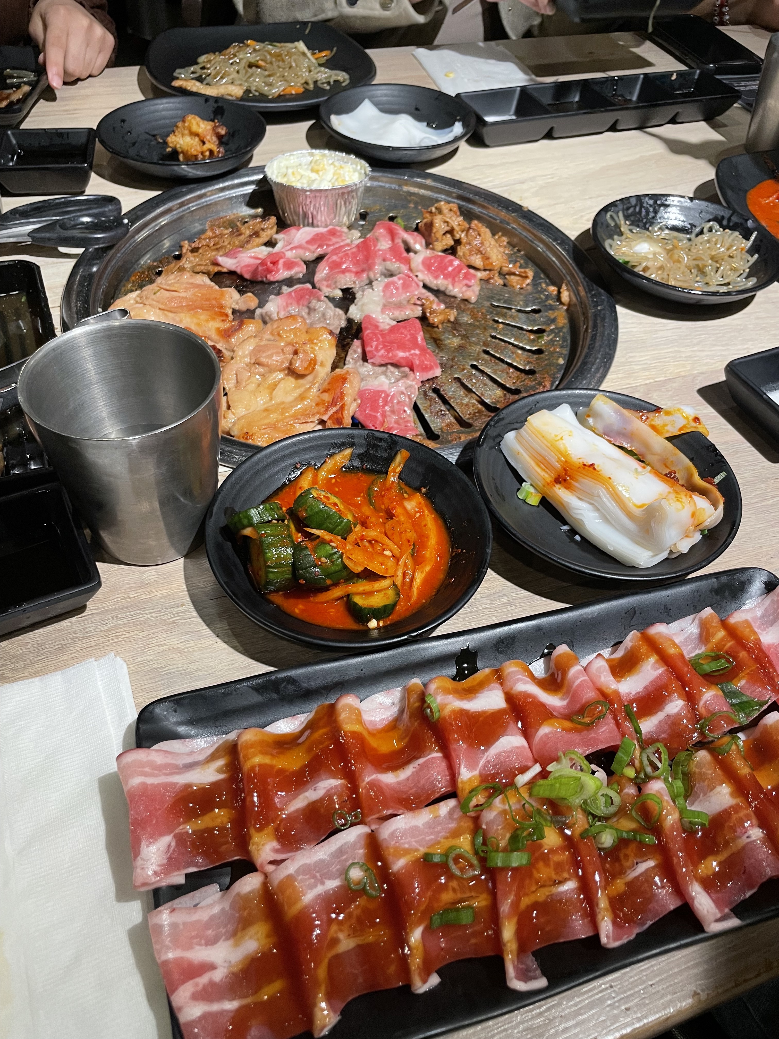 korean bbq with meat and sides