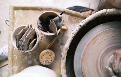 Pottery throwing wheel and tools from an aerial view