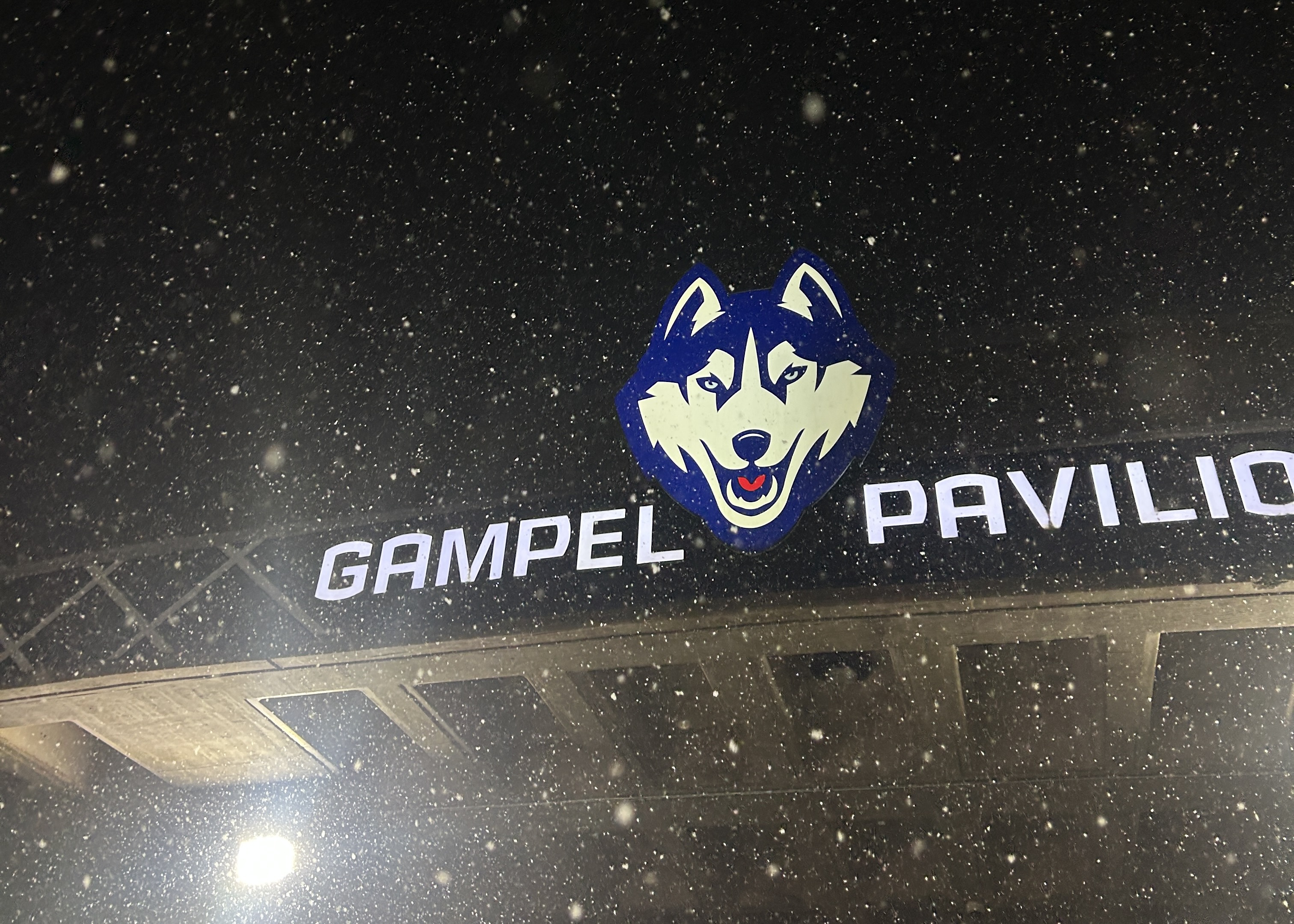 Snowing outside of Gampel Pavilion Basketball