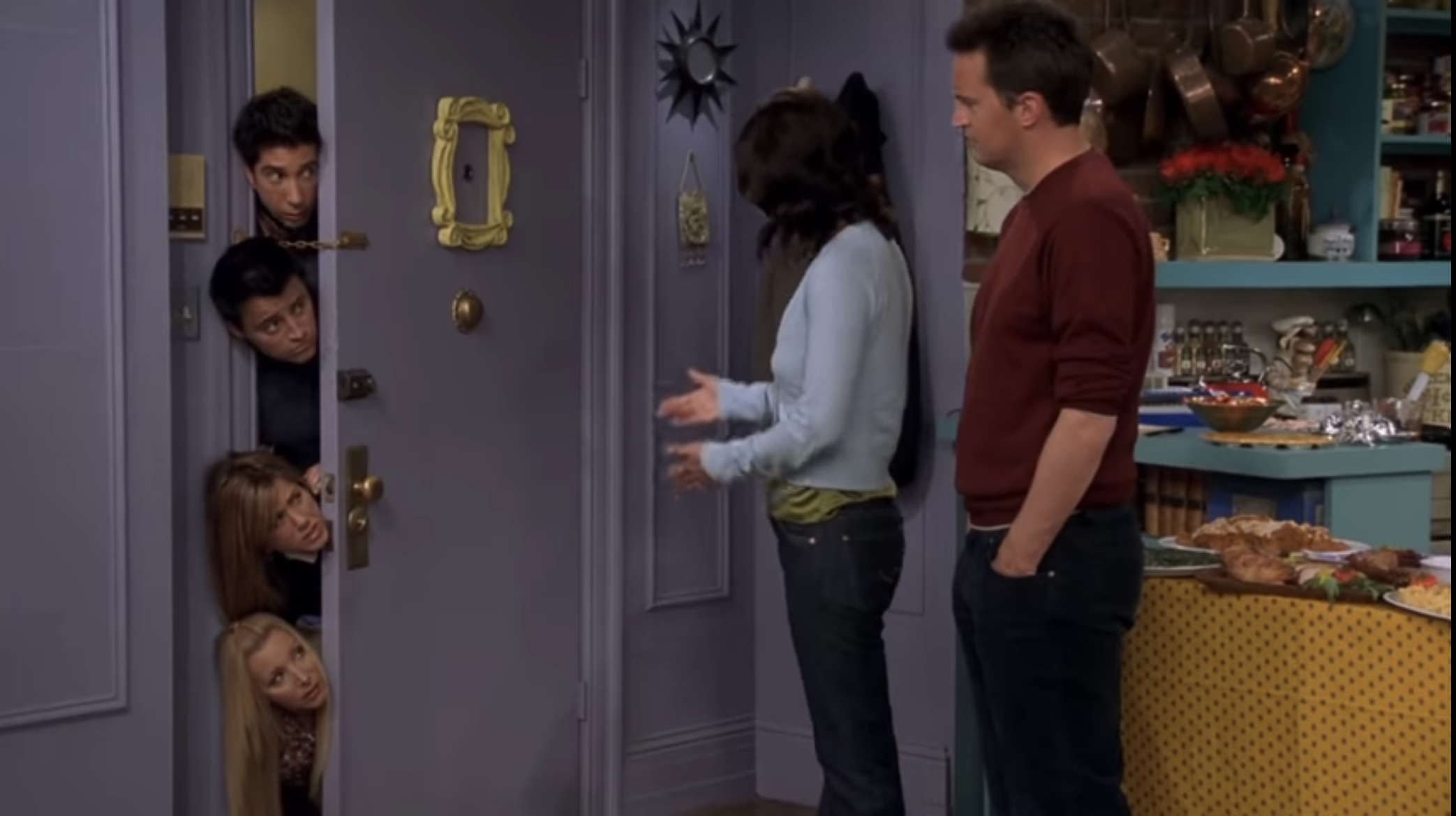 Friends cast looking in doorway