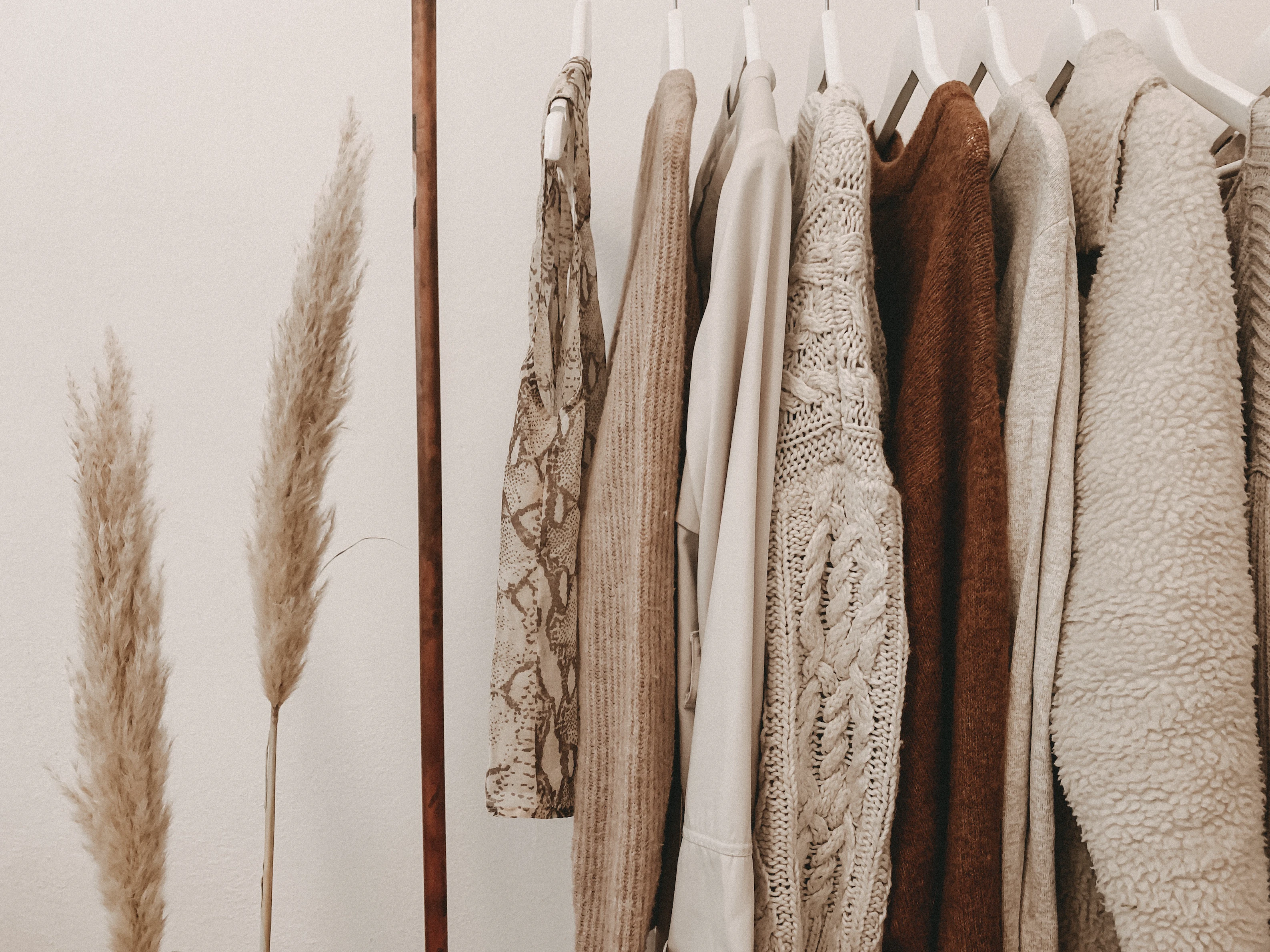 fall themed clothes on rack