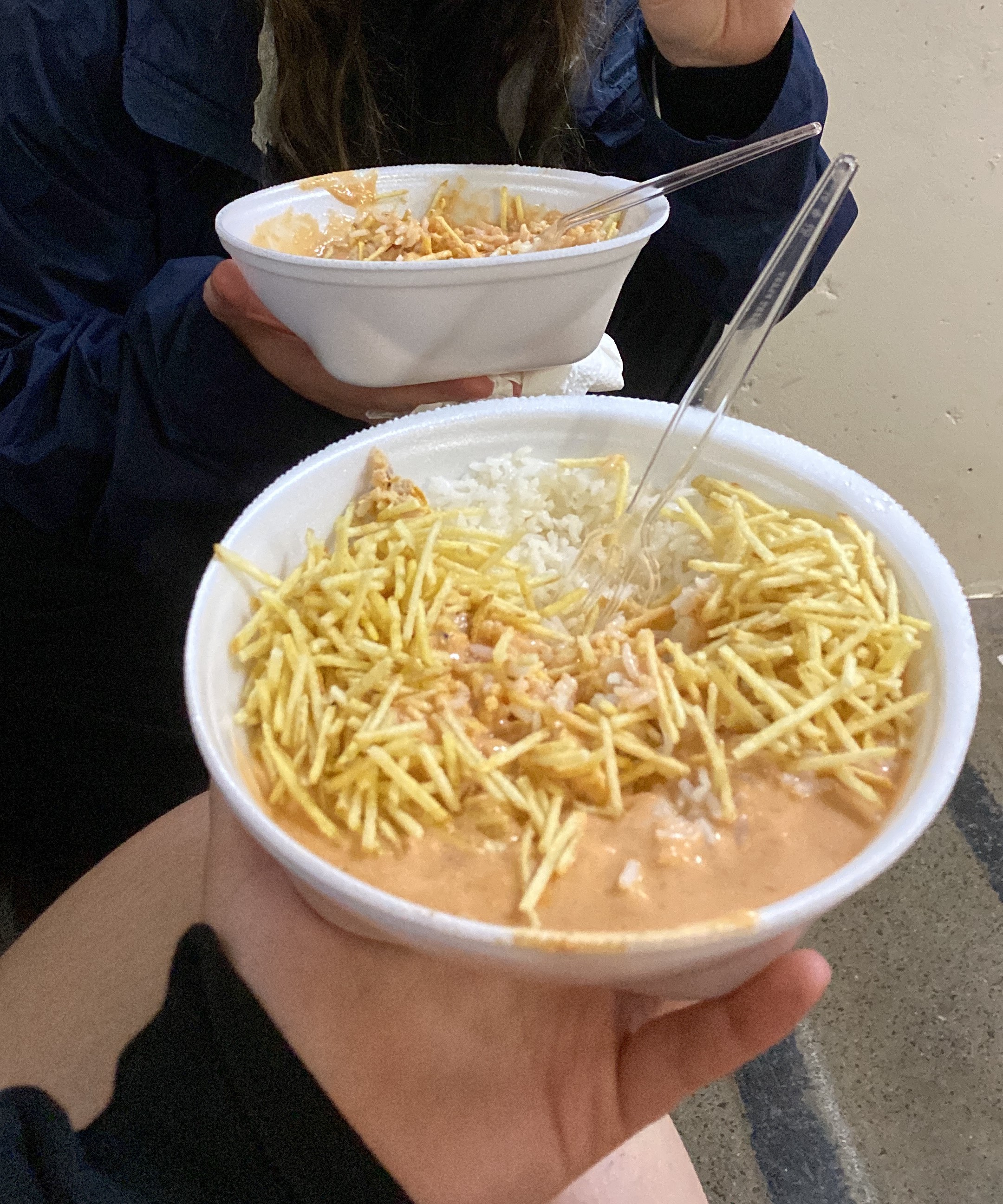 Two friends having a meal at JUCA
