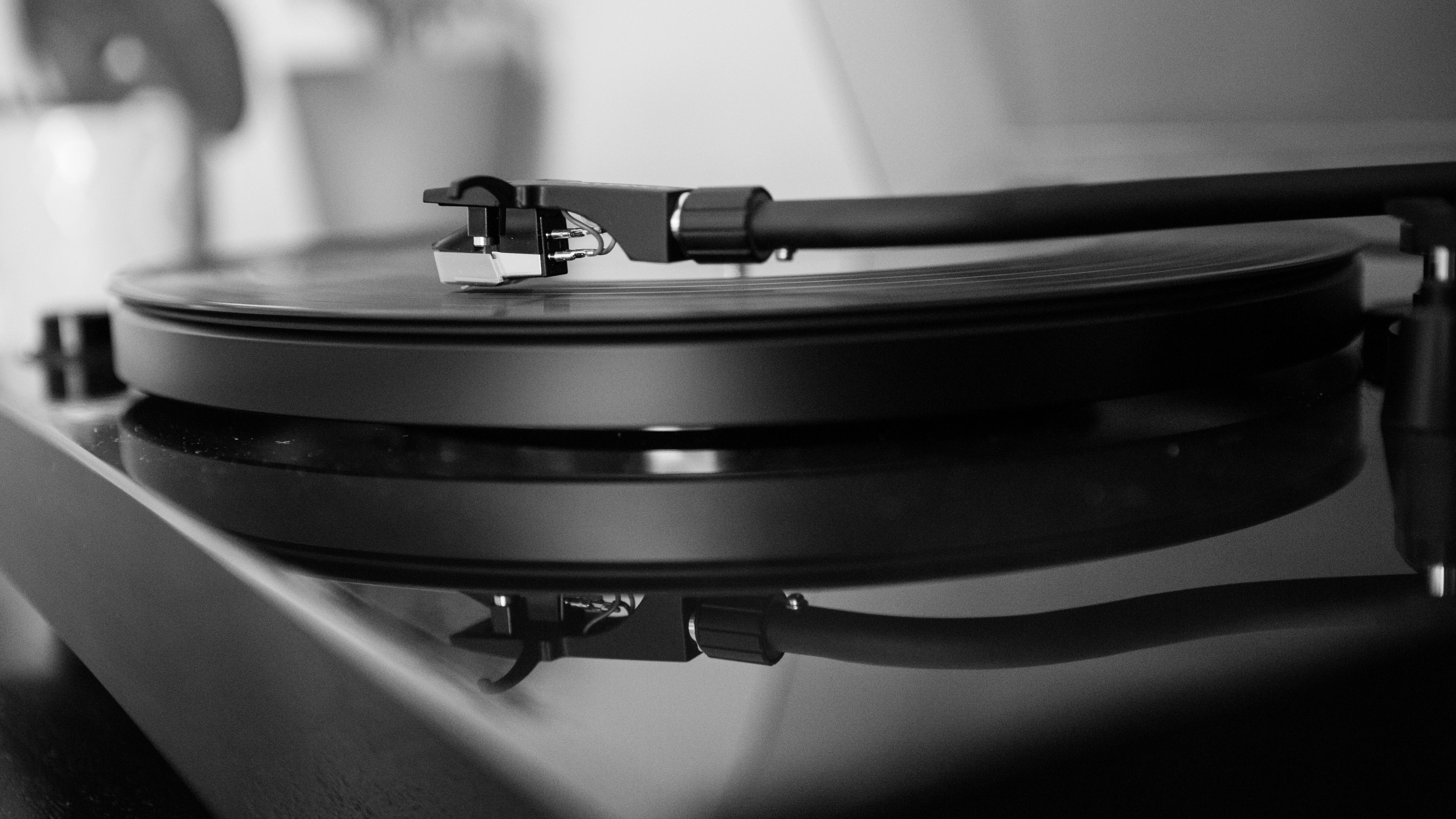 record player by Unsplash?width=698&height=466&fit=crop&auto=webp&dpr=4