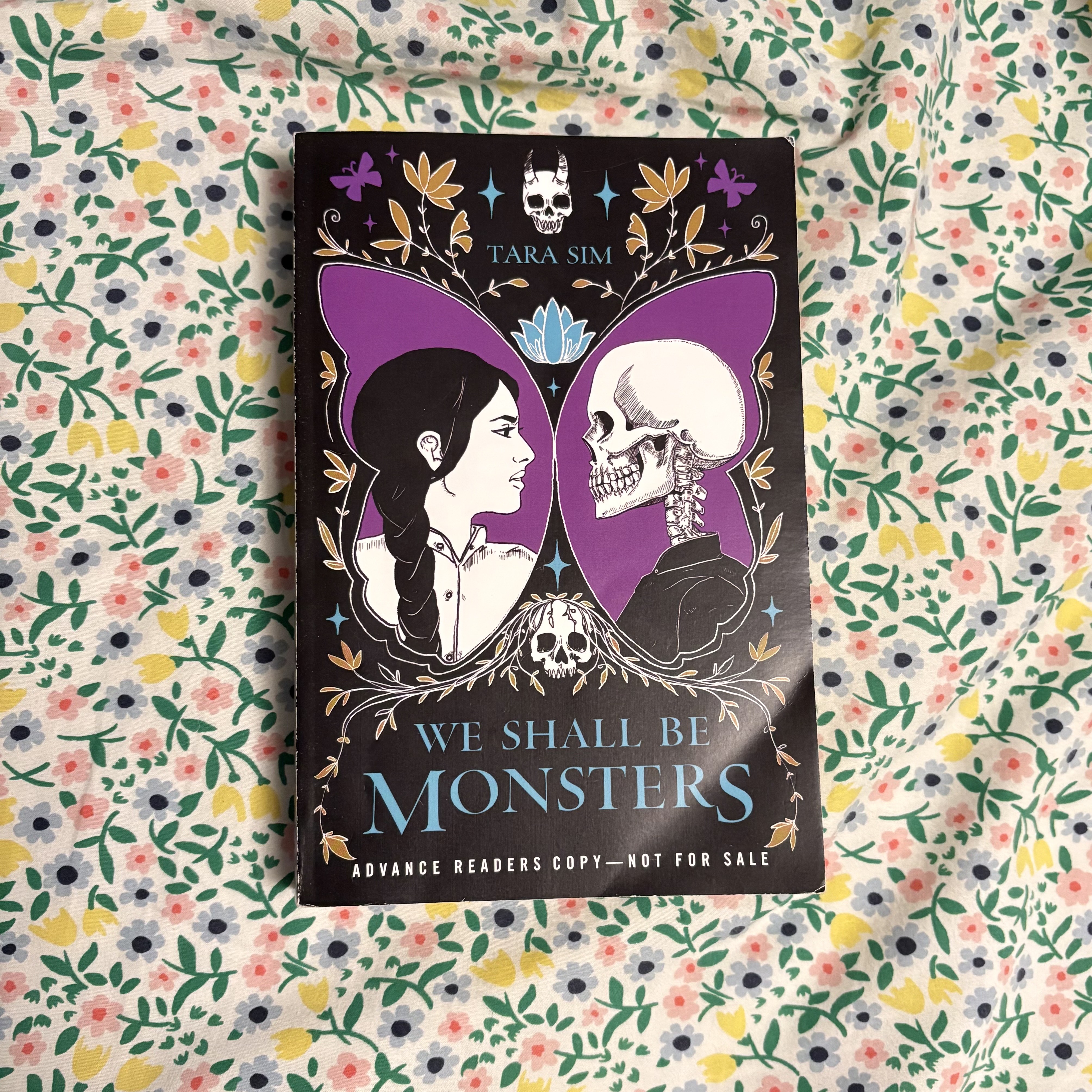 book cover of we shall be monsters on bedsheet