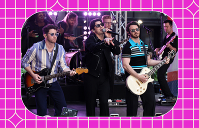 jonas brother performing on stage