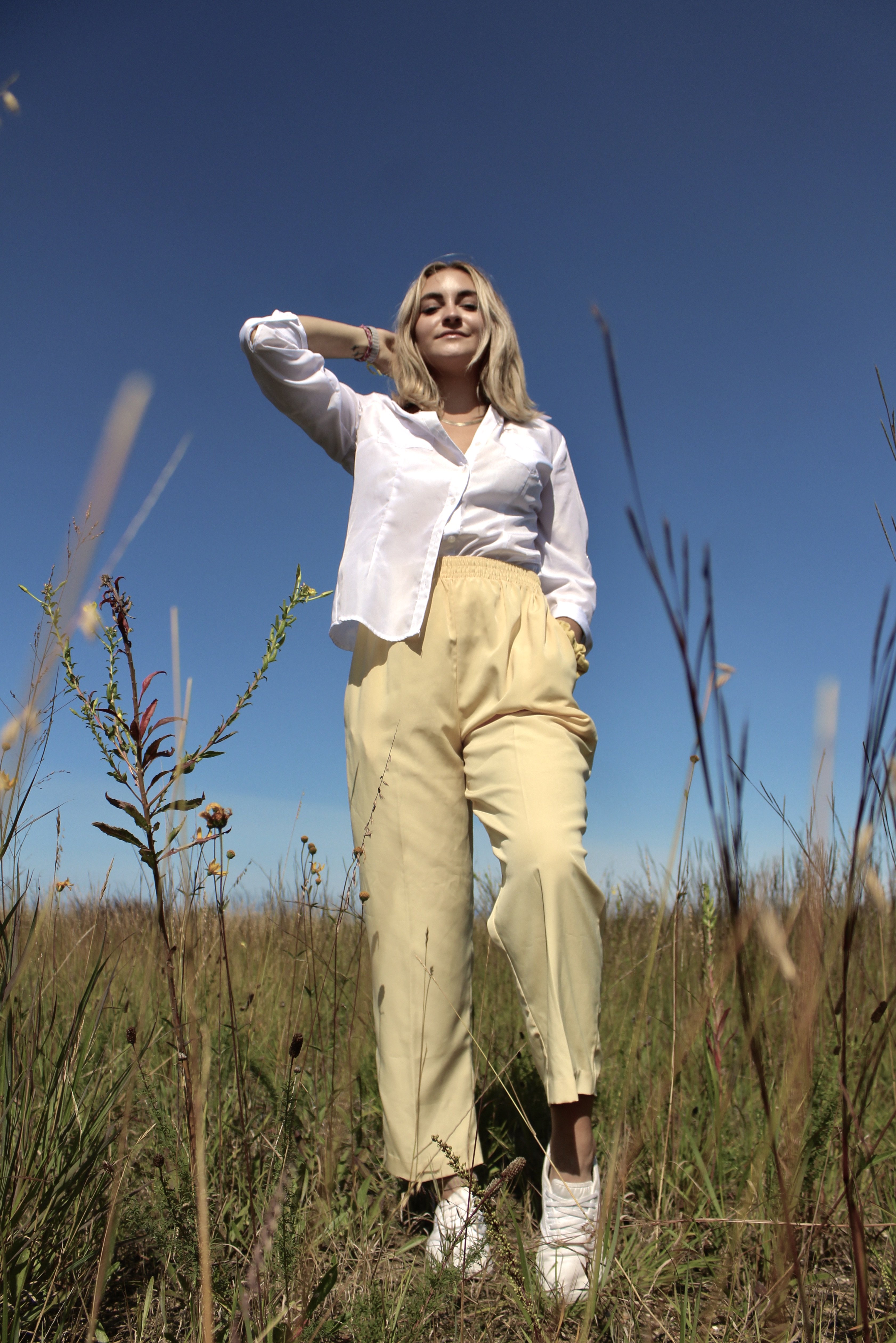 Girl in wildflower field