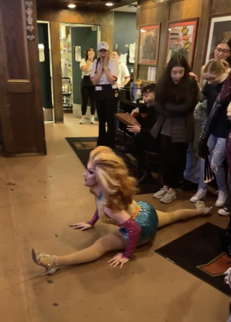 drag queen doing a split