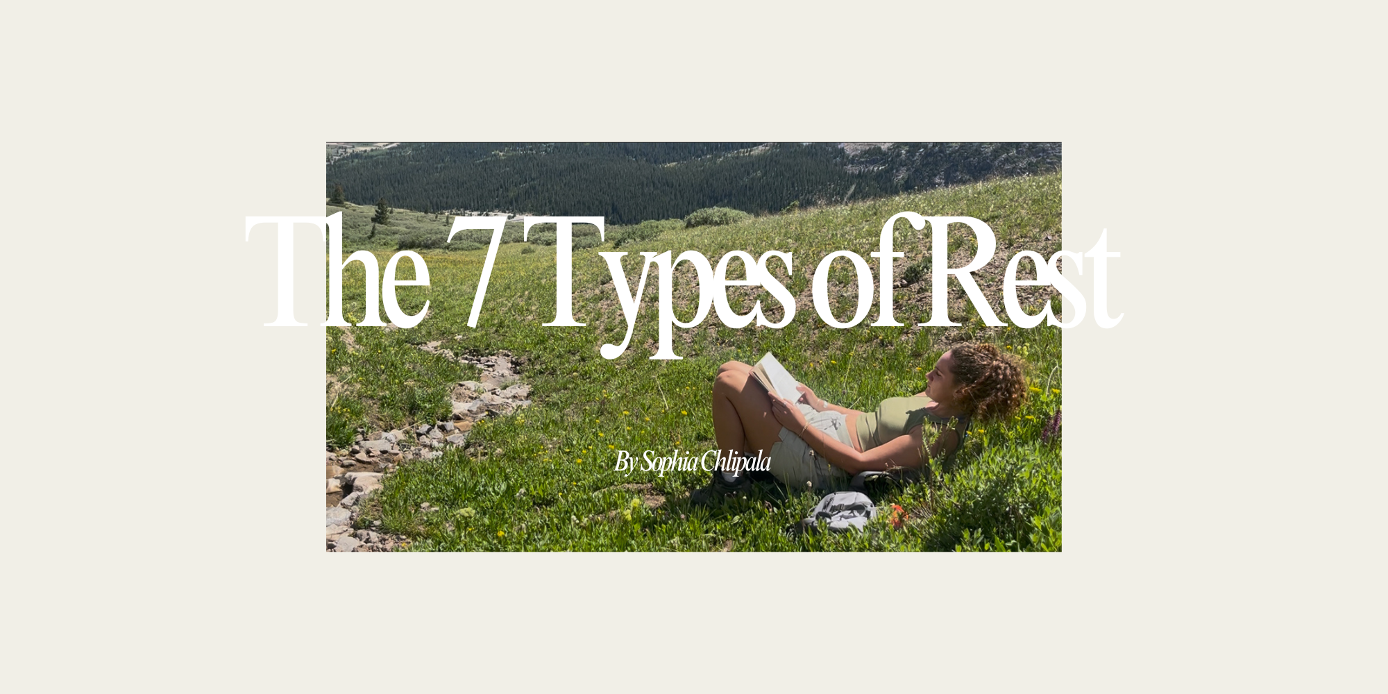 reading a book by a creek