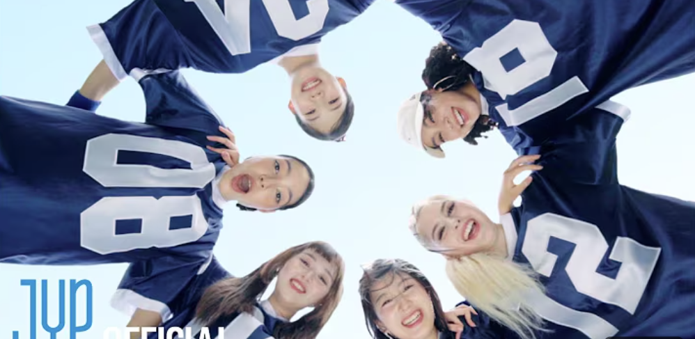 six girls wearing jerseys