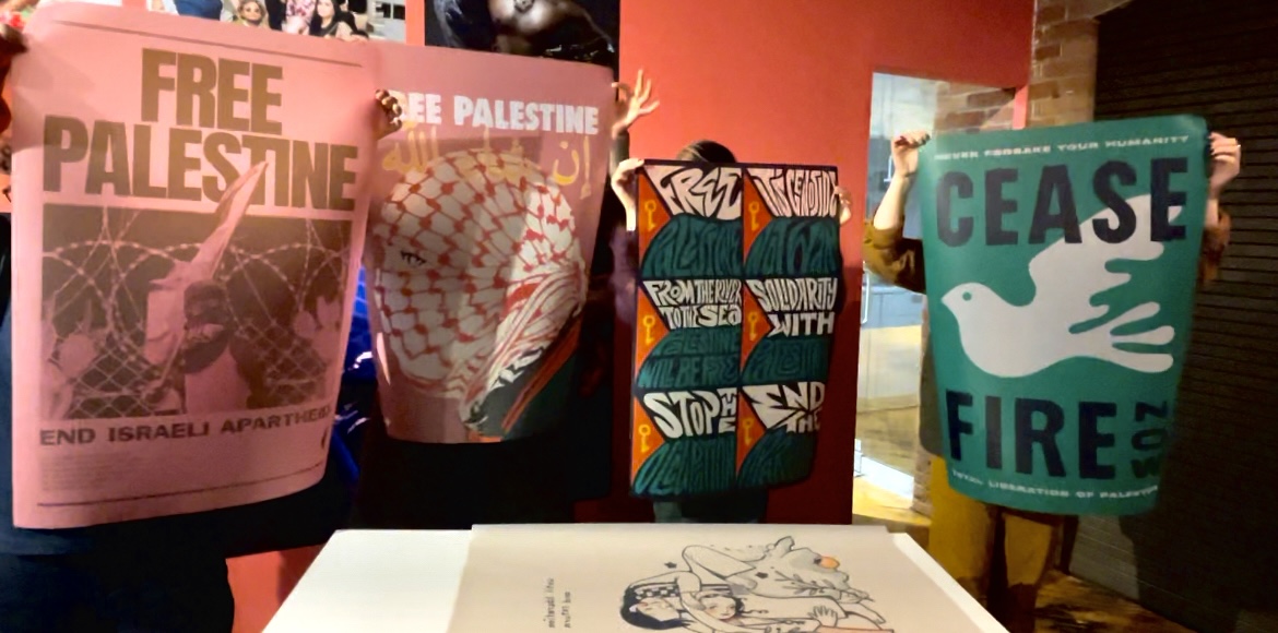 Posters at a postering event for the Palestinian cause, spreading awareness.
