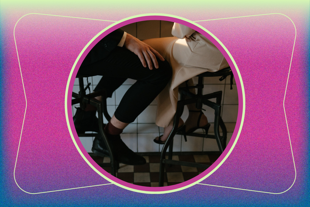 Couple playing footsie under the table