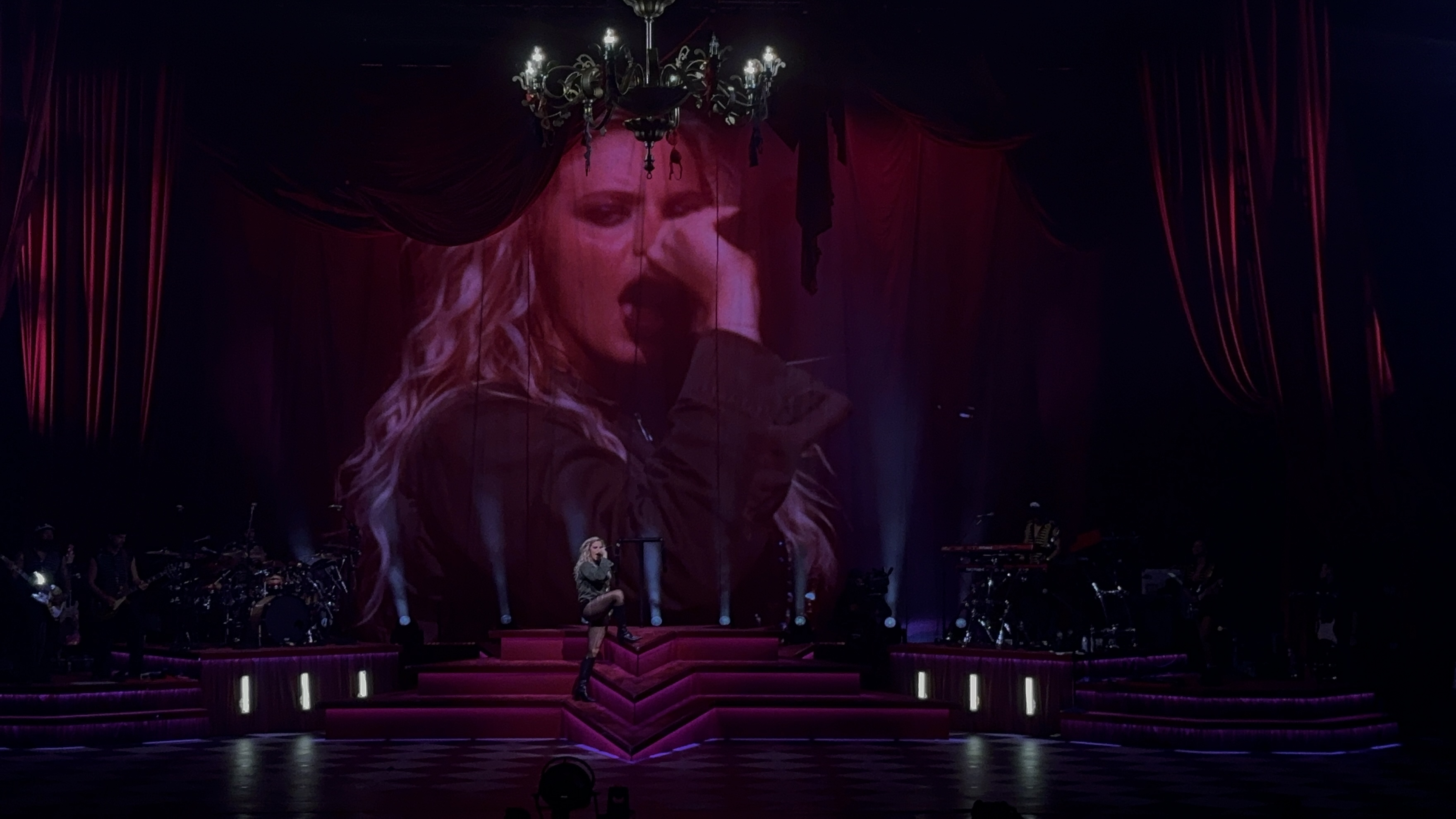 Artist Reneè Rapp performing on stage