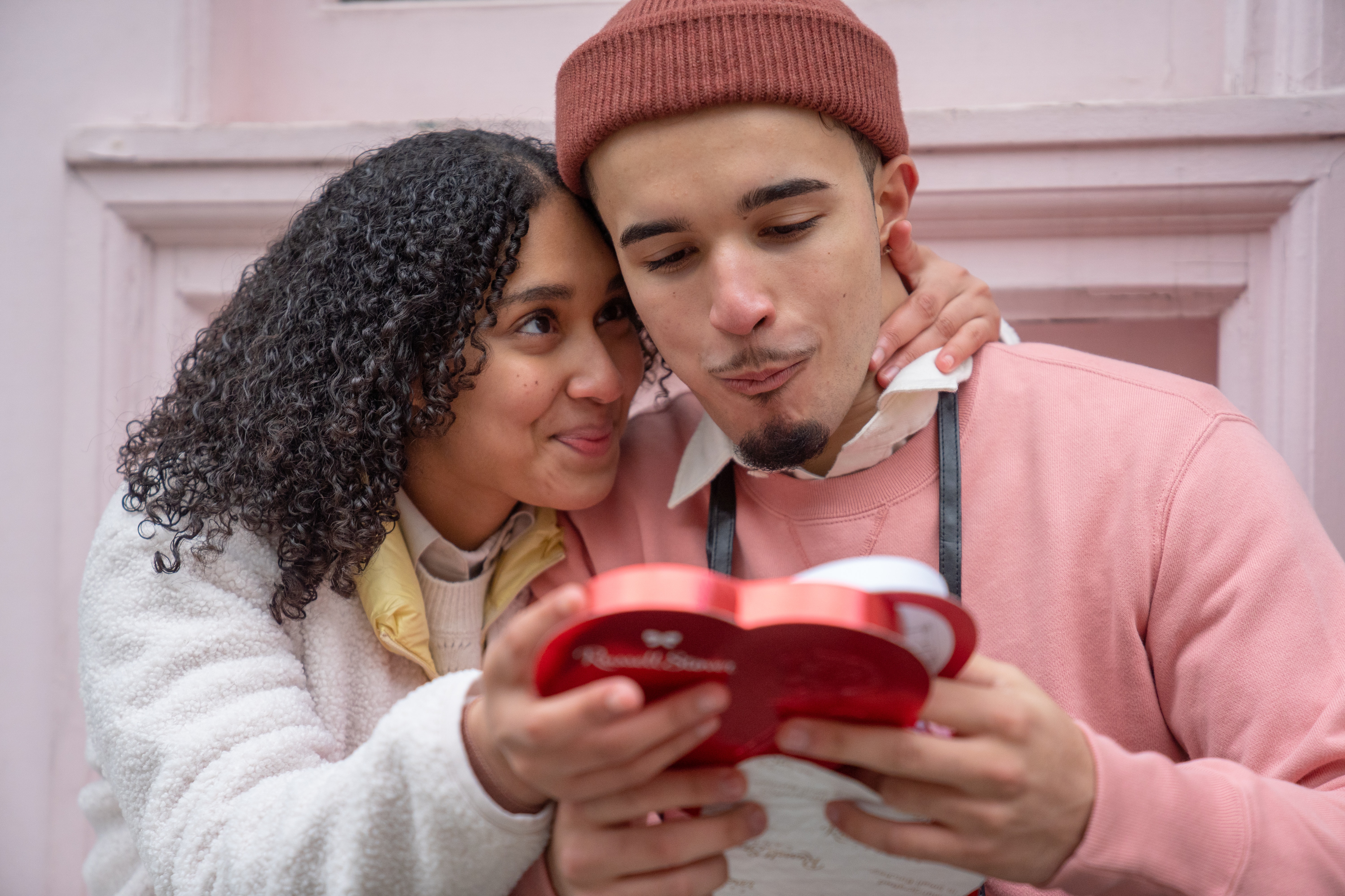 couple eating chocolates on streets
