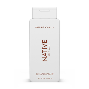 white bottle of body wash with brown lettering