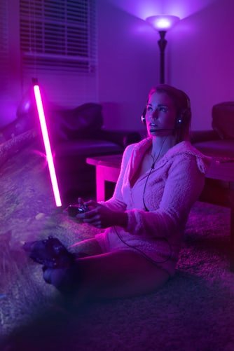 girl gamer with neon lightsjpg by Unsplash?width=698&height=466&fit=crop&auto=webp&dpr=4