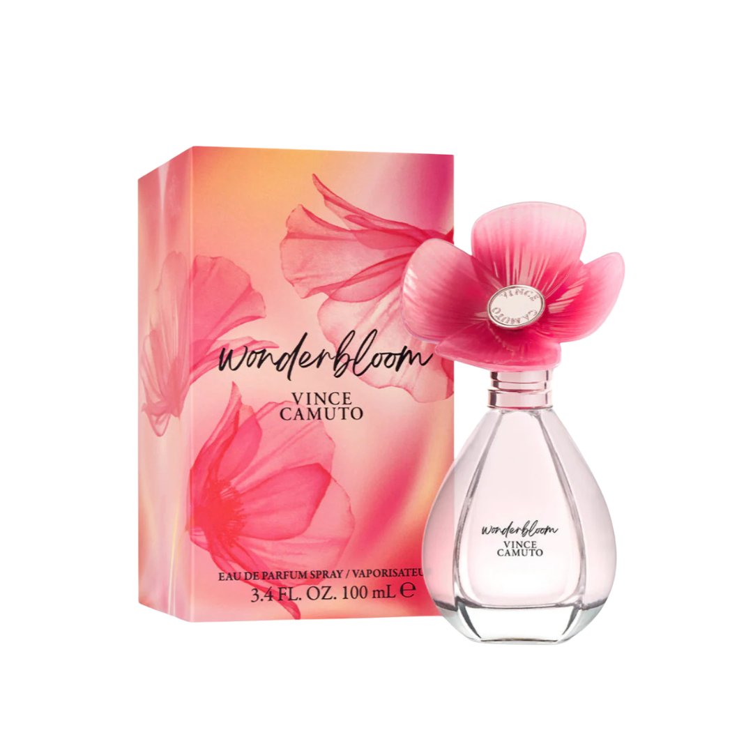 A bottle of Vince Camuto Wonderbloom perfume with a pink flower-shaped cap is displayed next to its matching pink and orange floral box.