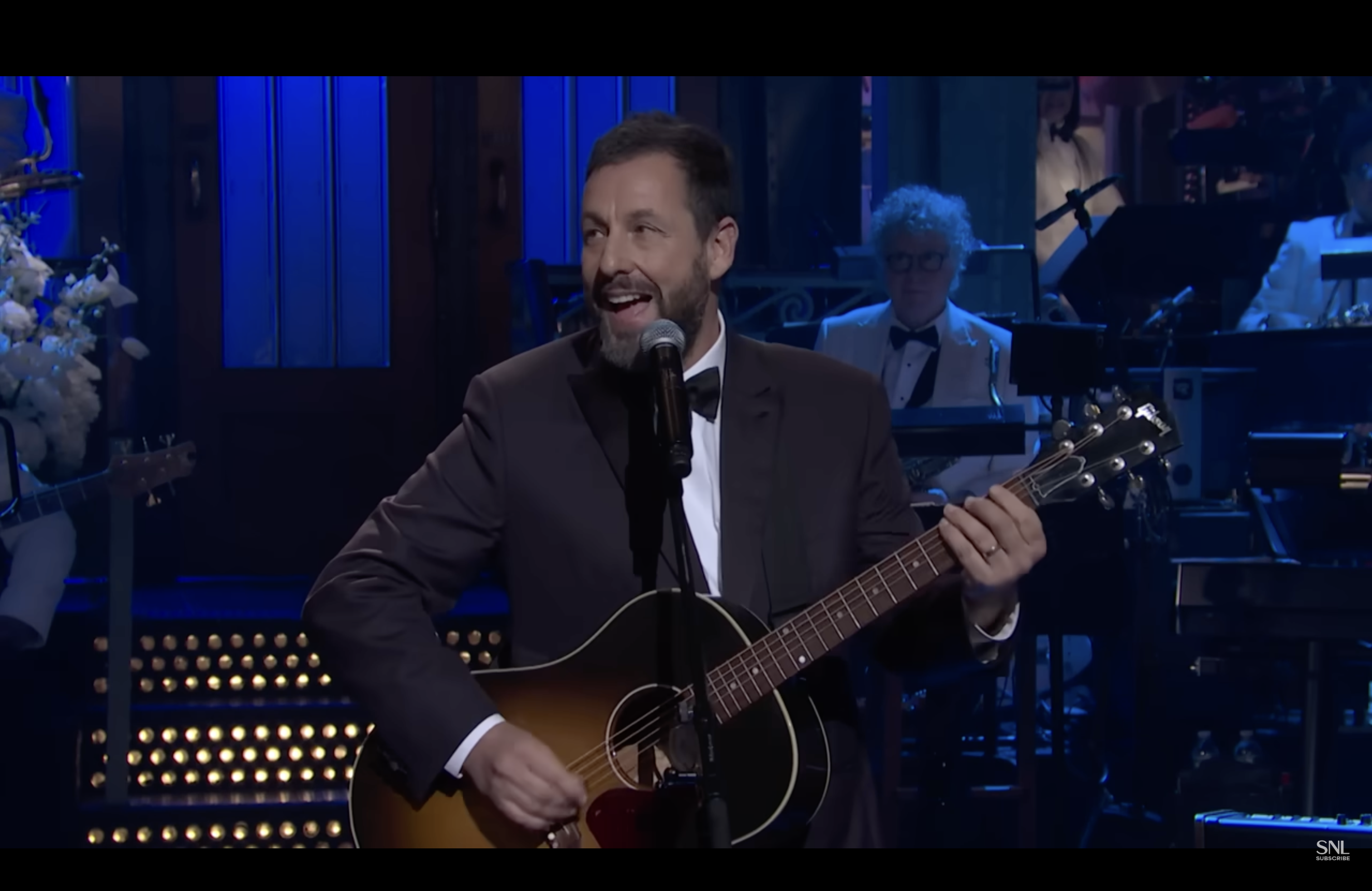 screen grab of adam sandler at 50th snl special