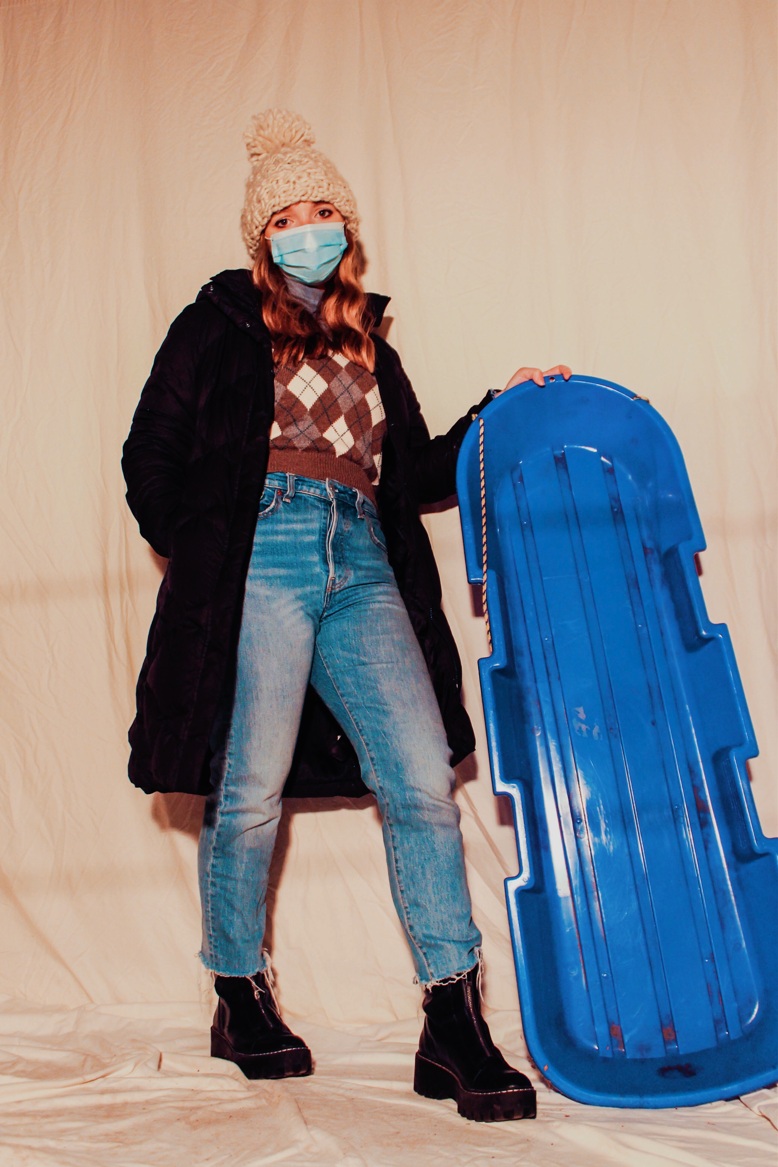 Woman from 2020 in front of white backdrop
