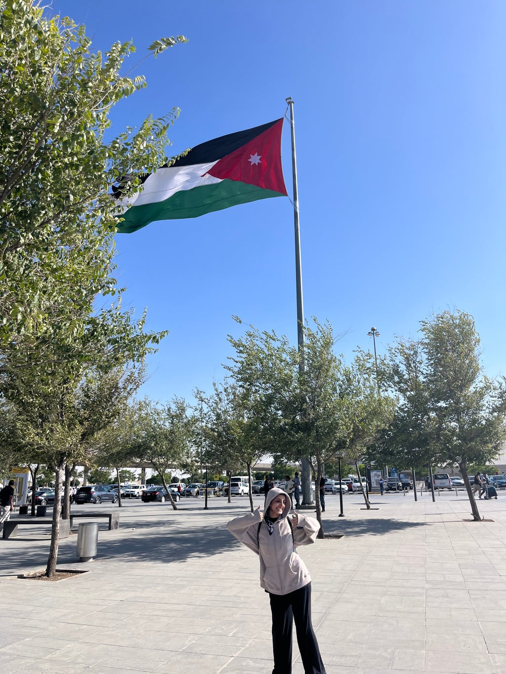 Picture I took of my friend by the Jordanian flag