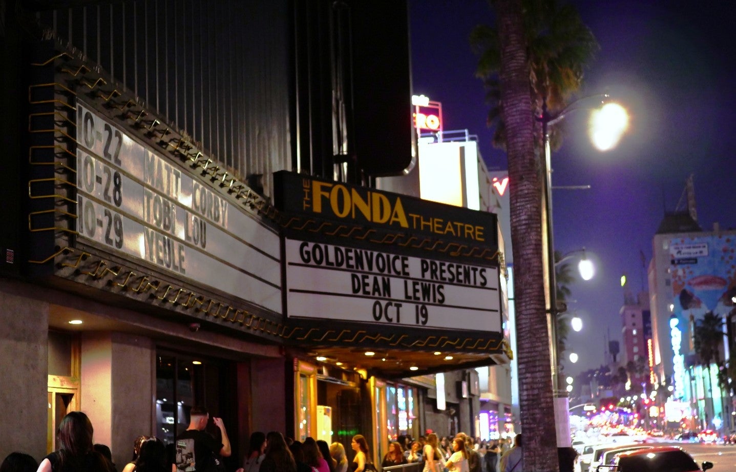 sign on Fonda Theatre at night reads Dean Lewis as fans line up below