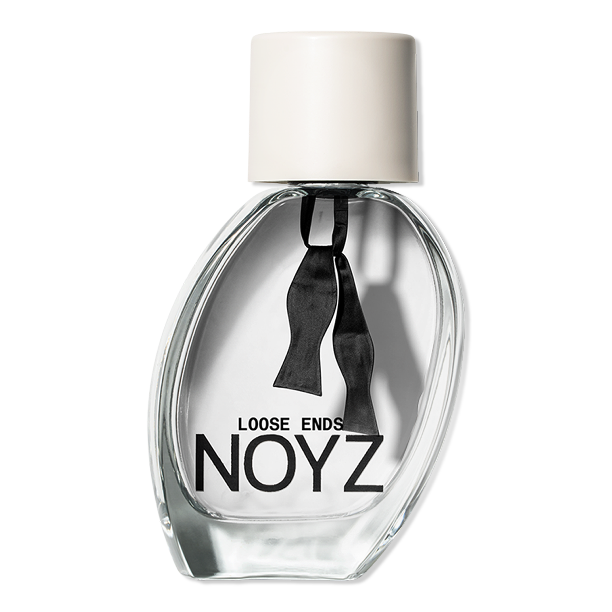 A clear glass NOYZ perfume bottle with a white cap and loose black ribbons inside, photographed against a black background; minimalist, dramatic packaging.