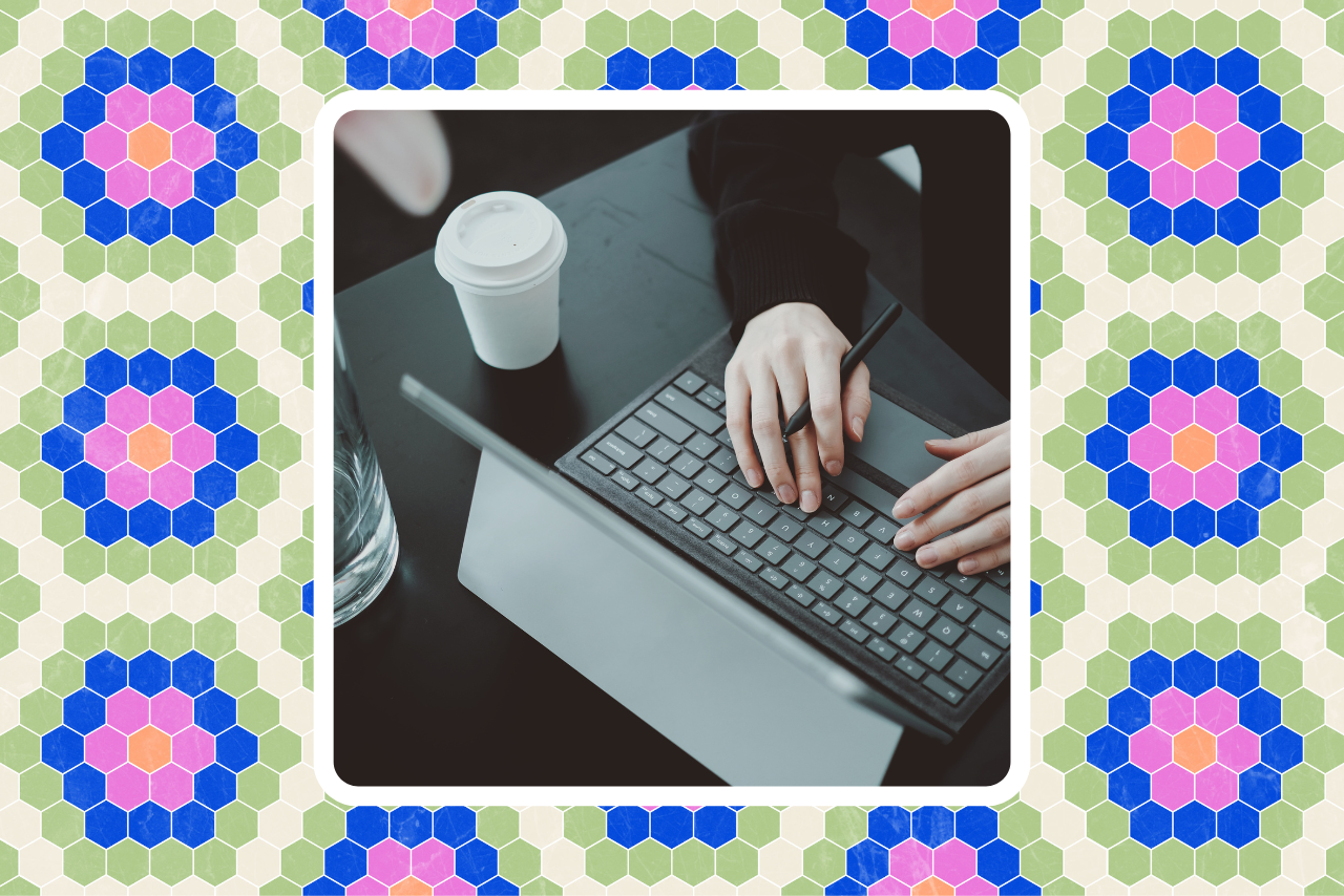 person working at computer looking for a 2023 side hustle