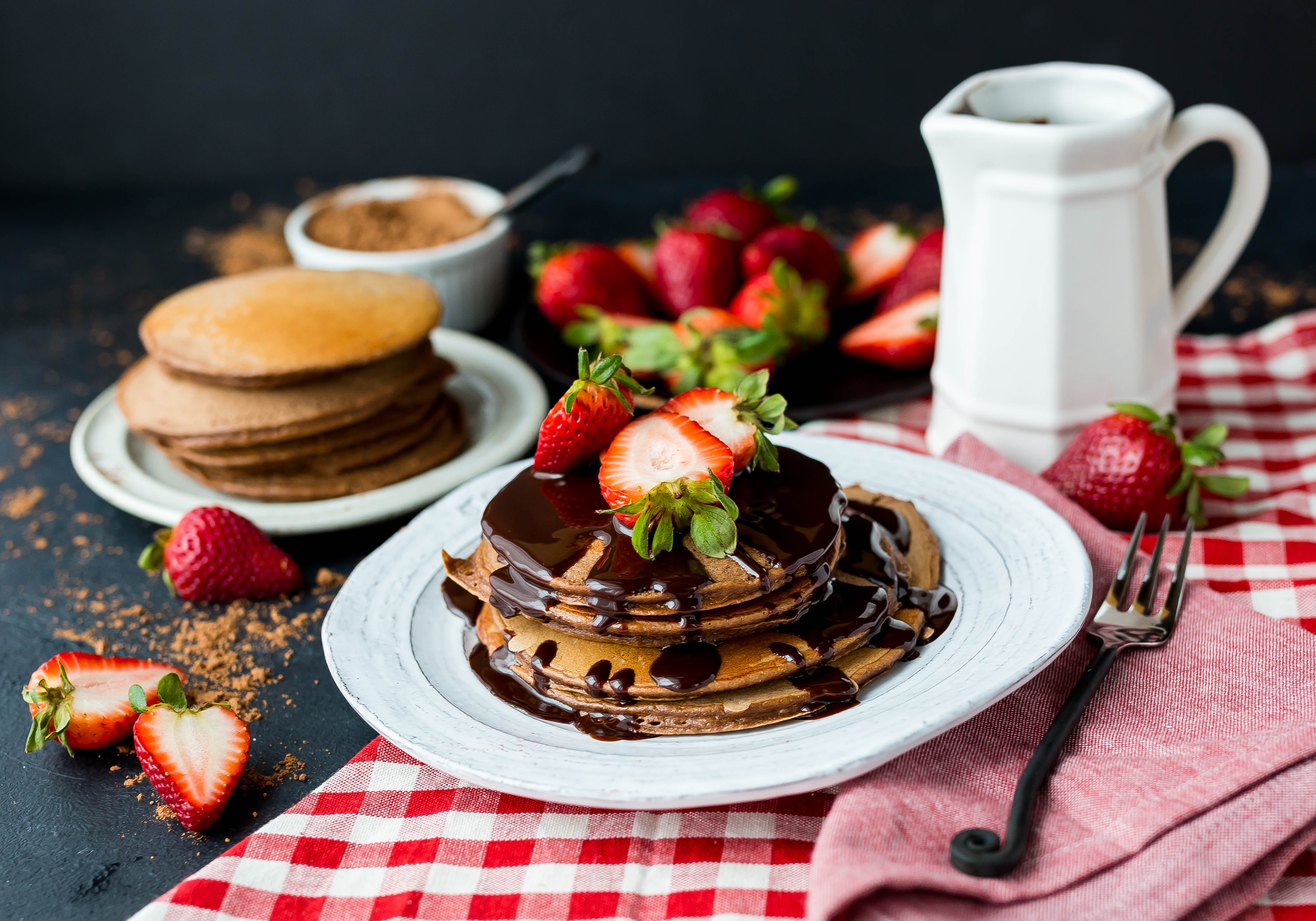 Chocolate pancakes with strawberries by Whitney Wright?width=698&height=466&fit=crop&auto=webp&dpr=4