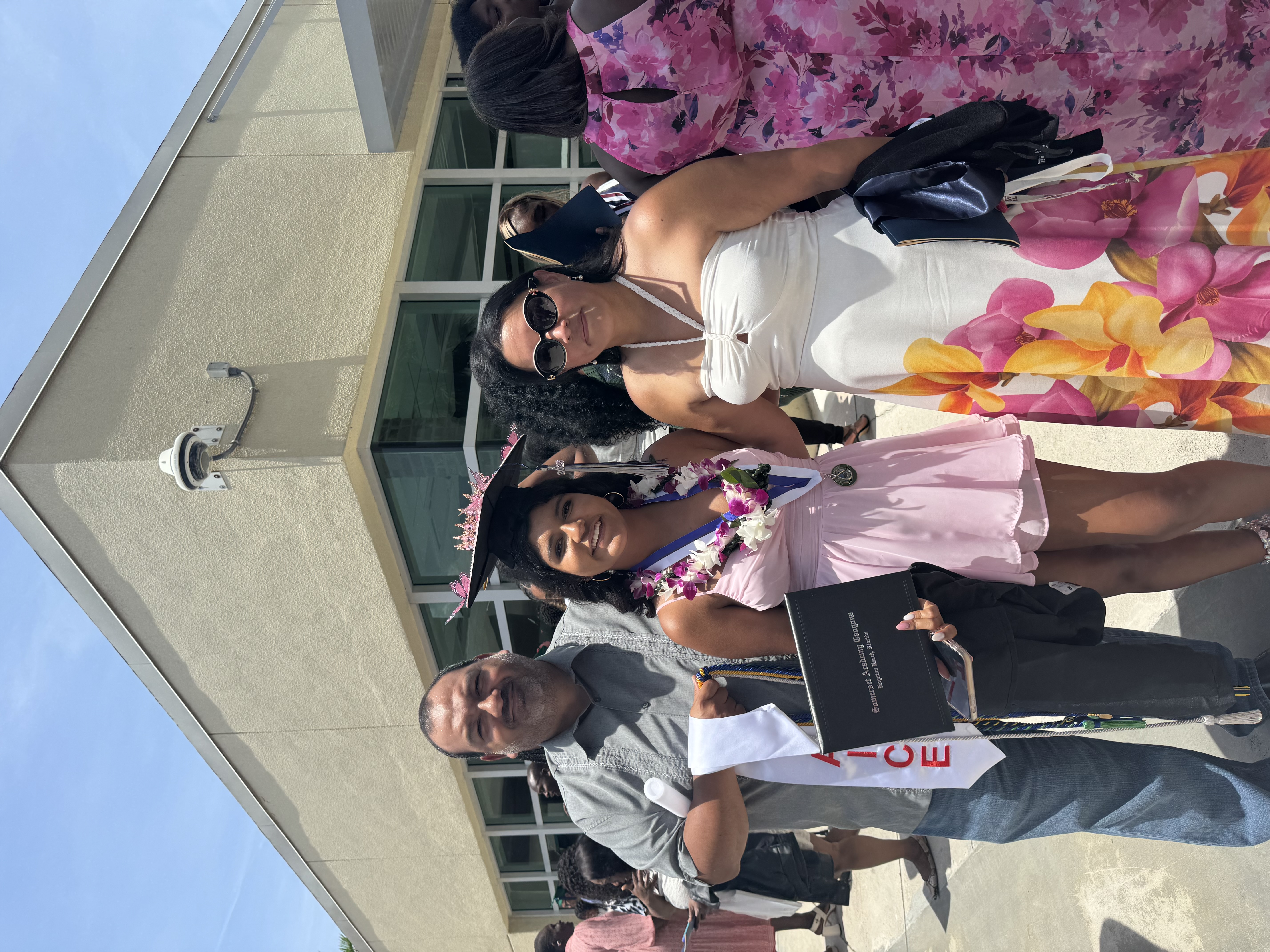 Graduation photo with parents