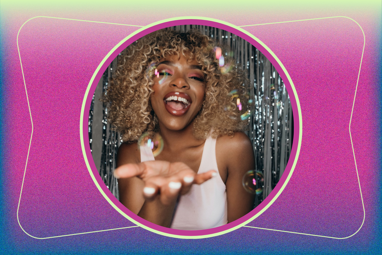 smiling girl at party with confetti