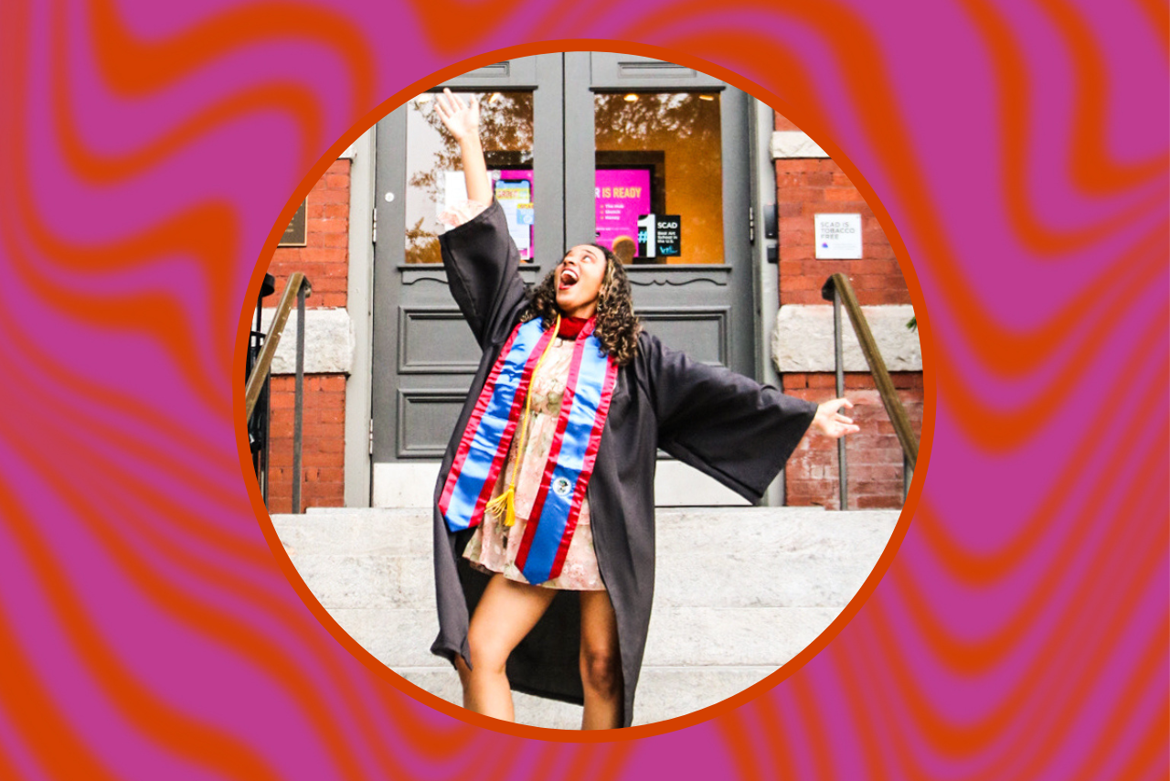 kaitlynne rainne (the author) on campus at scad in graduation robes