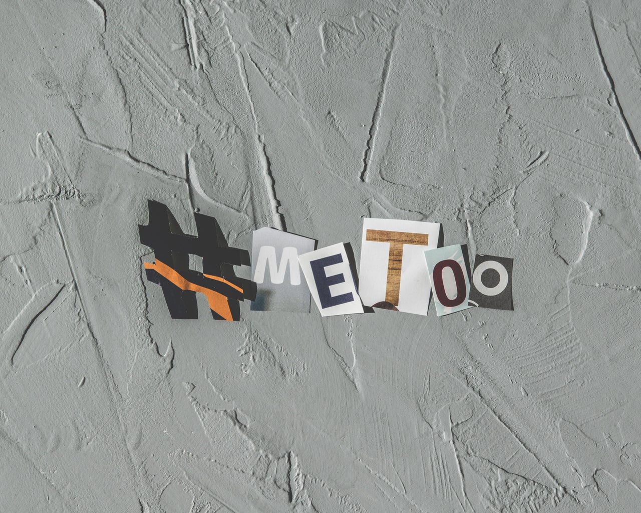 Scrap-booked letters spelling #MeToo