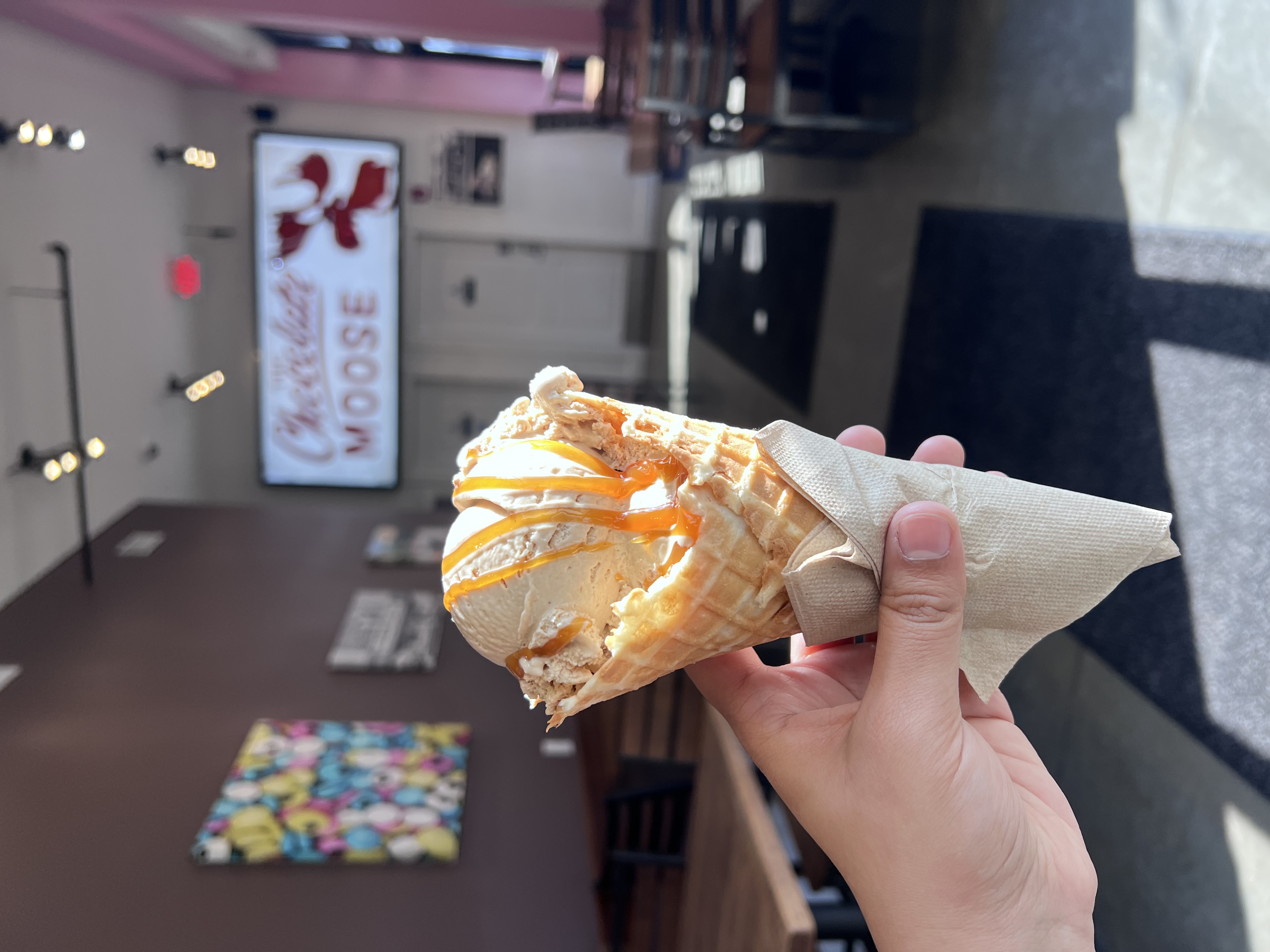 Caramel apple ice cream in a cone from Chocolate Moose\'s fall flavors