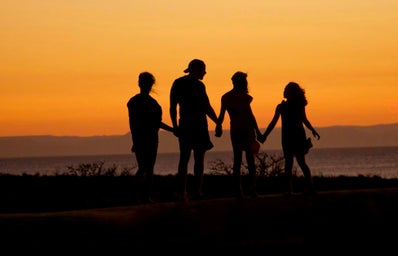 family beach sunset