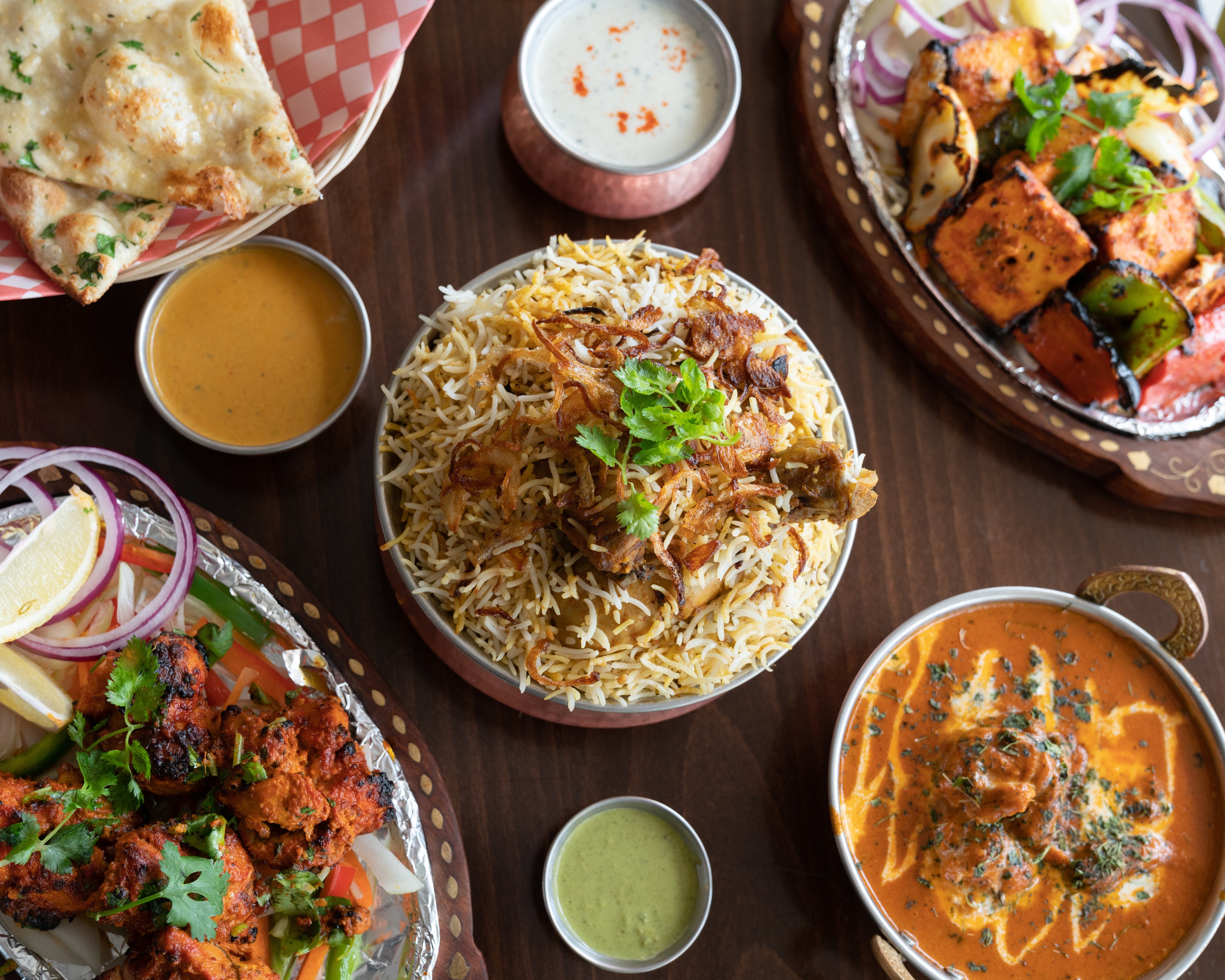 indianfoodonrestauranttable?width=698&height=466&fit=crop&auto=webp&dpr=4