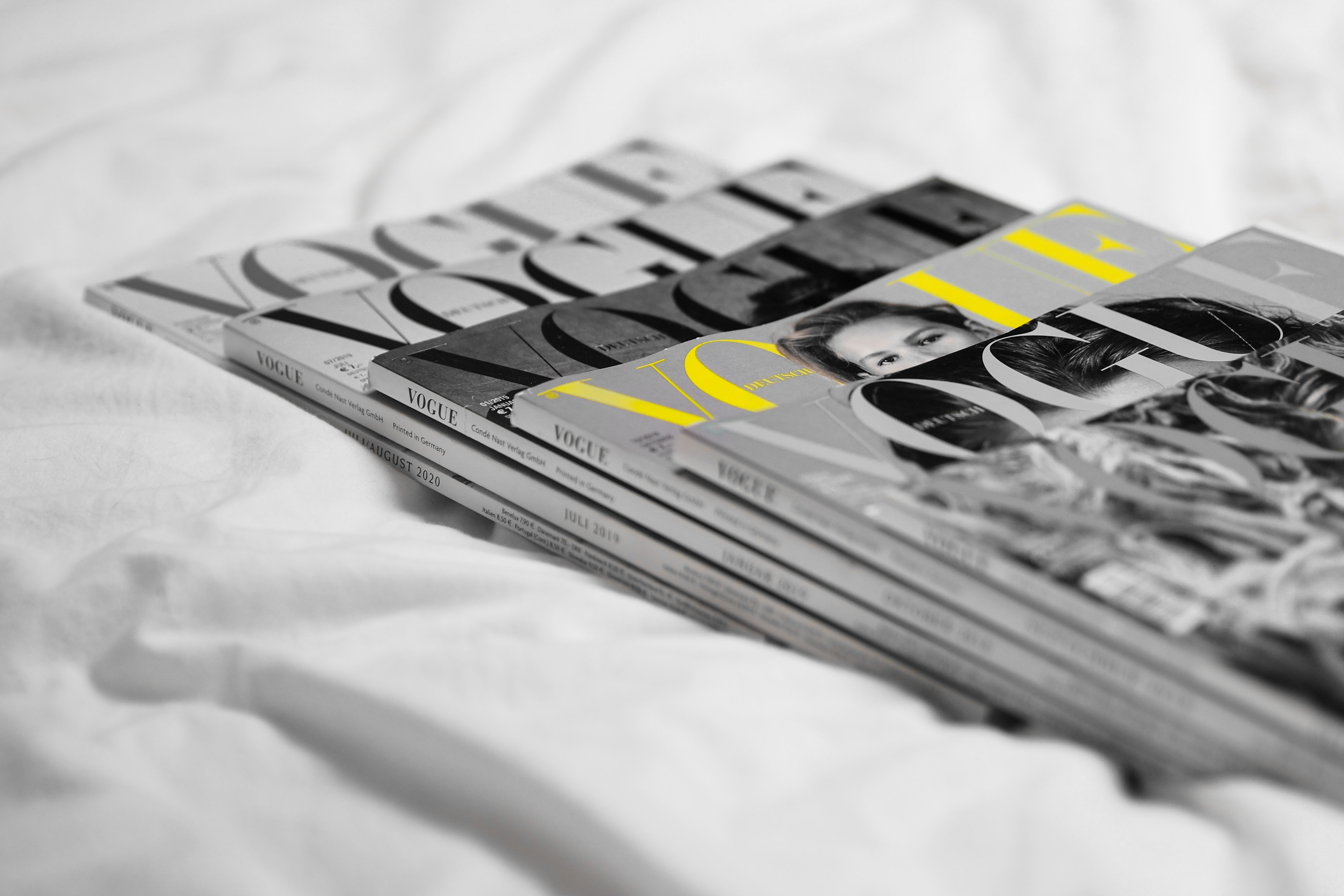 stack of vogue magazines by Laura Chouette