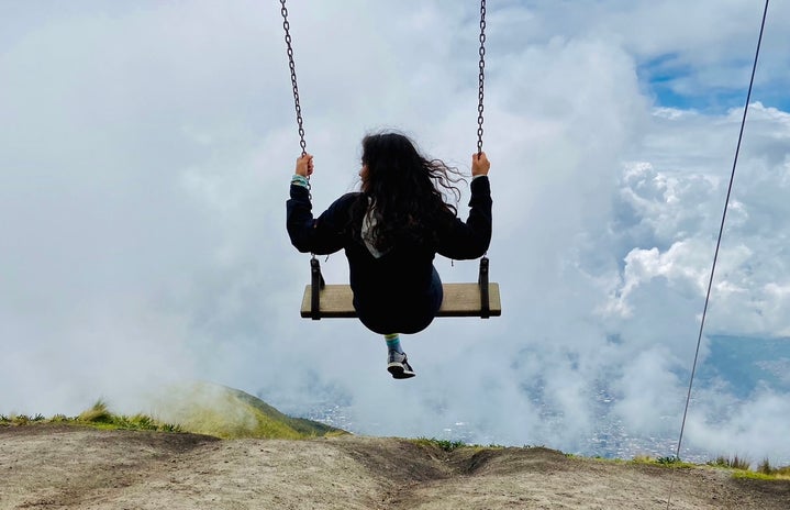 Girl on a swing in Ecuador.