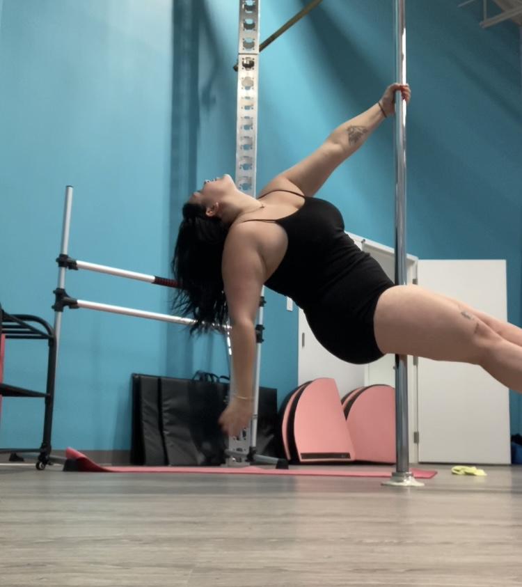 Picture of me pole dancing, fully clothed