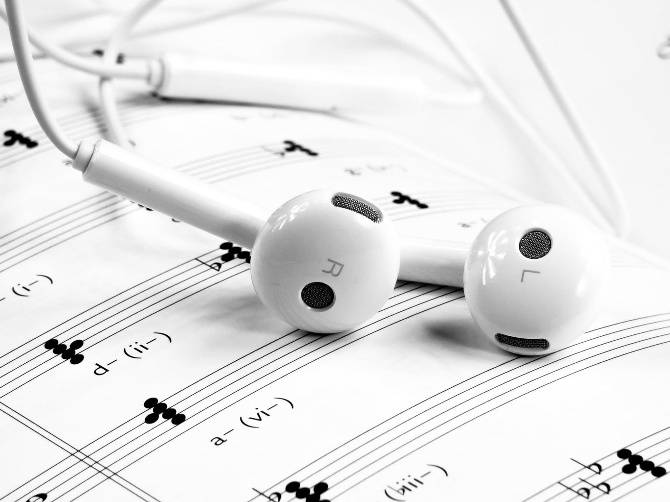 Earbuds and Sheet Music