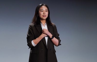 Close-up shot of TEDxICU speaker Utako Kawakami giving her TED talk.