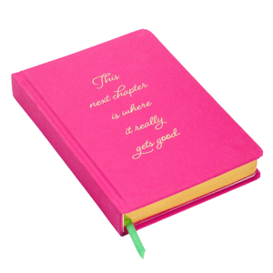 pink journal with quote that reads \