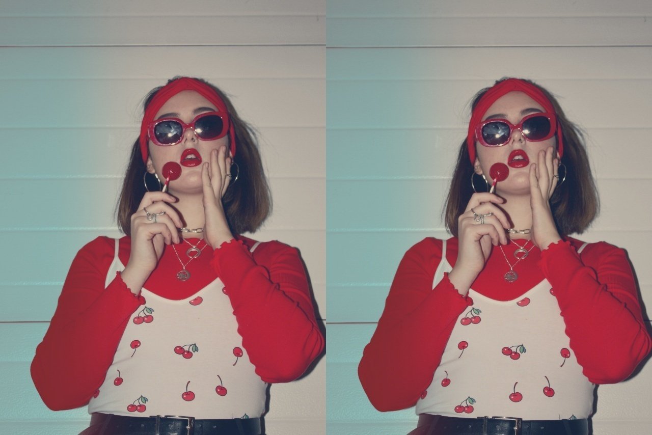 woman in red sweater cherry